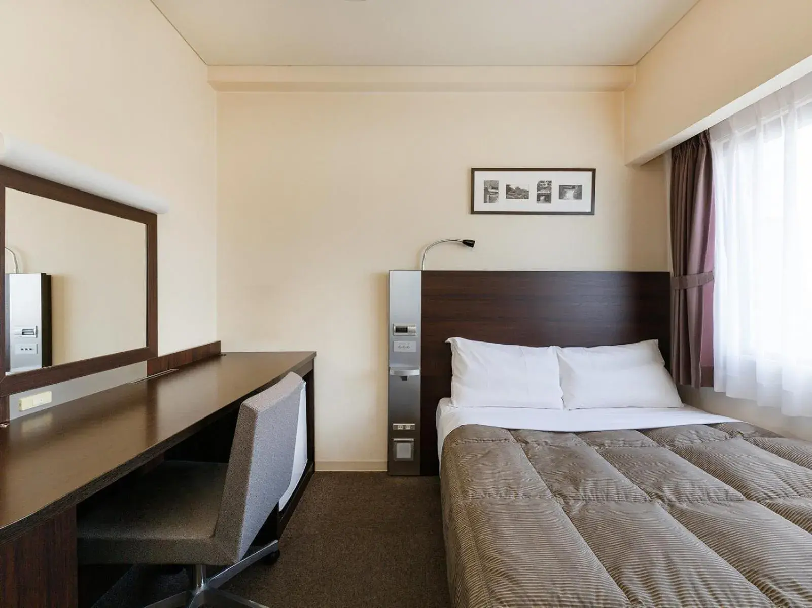 Photo of the whole room, Bed in The OneFive Okayama Photo of the whole room, Bed in The OneFive Okayama