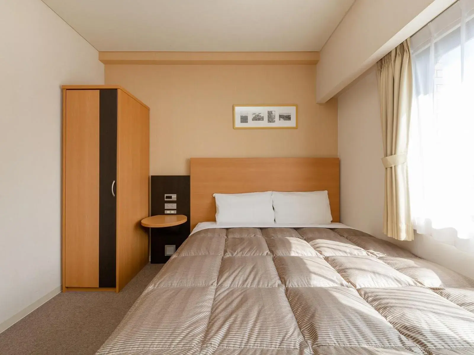 Photo of the whole room, Bed in The OneFive Okayama Photo of the whole room, Bed in The OneFive Okayama