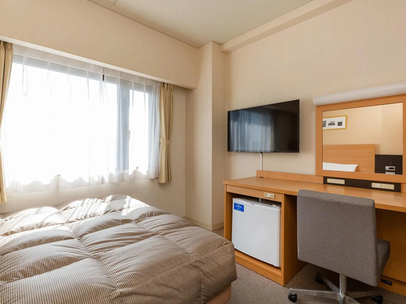 Photo of the whole room, Bed in The OneFive Okayama