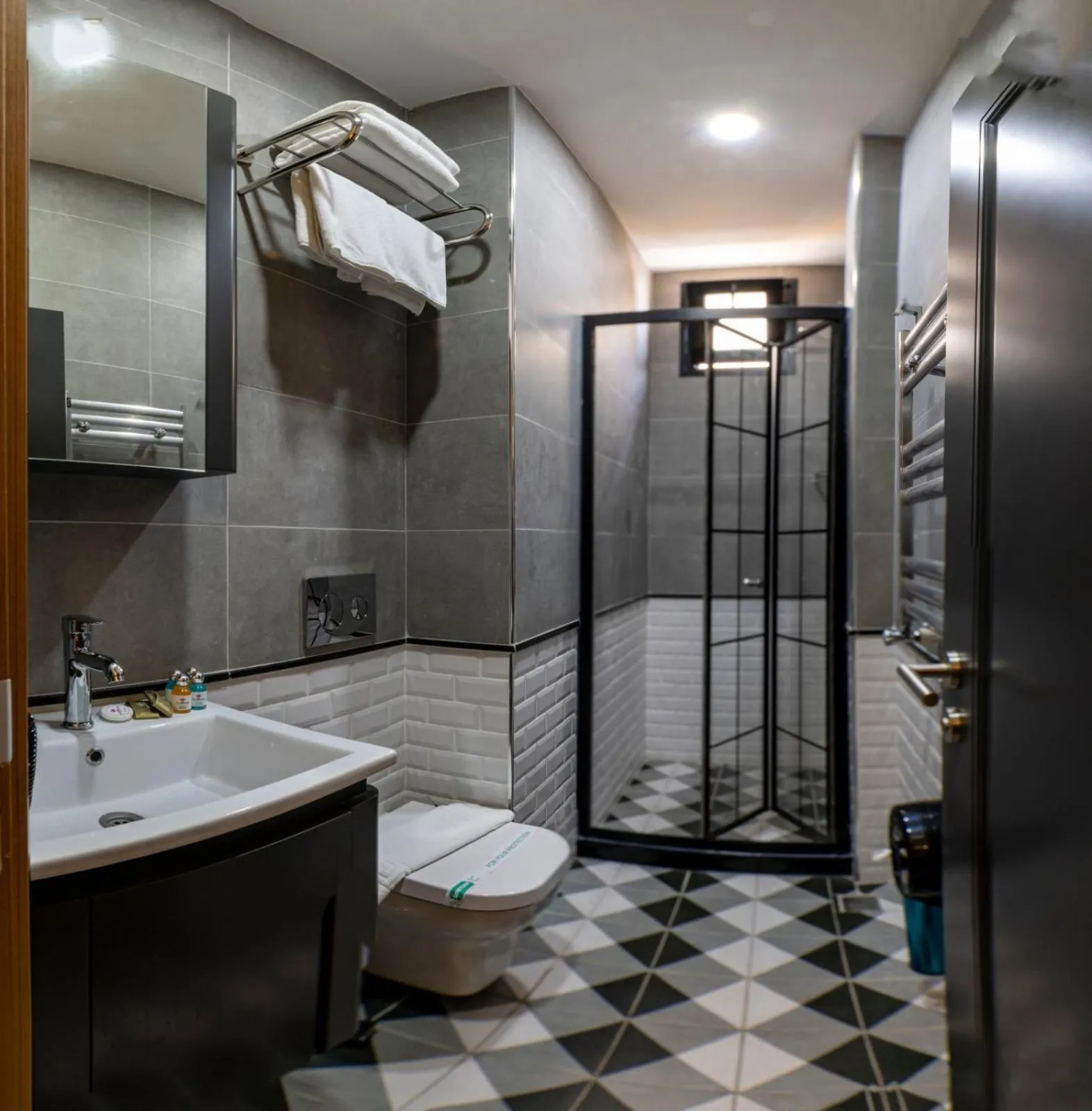 Shower in Confores Hotel