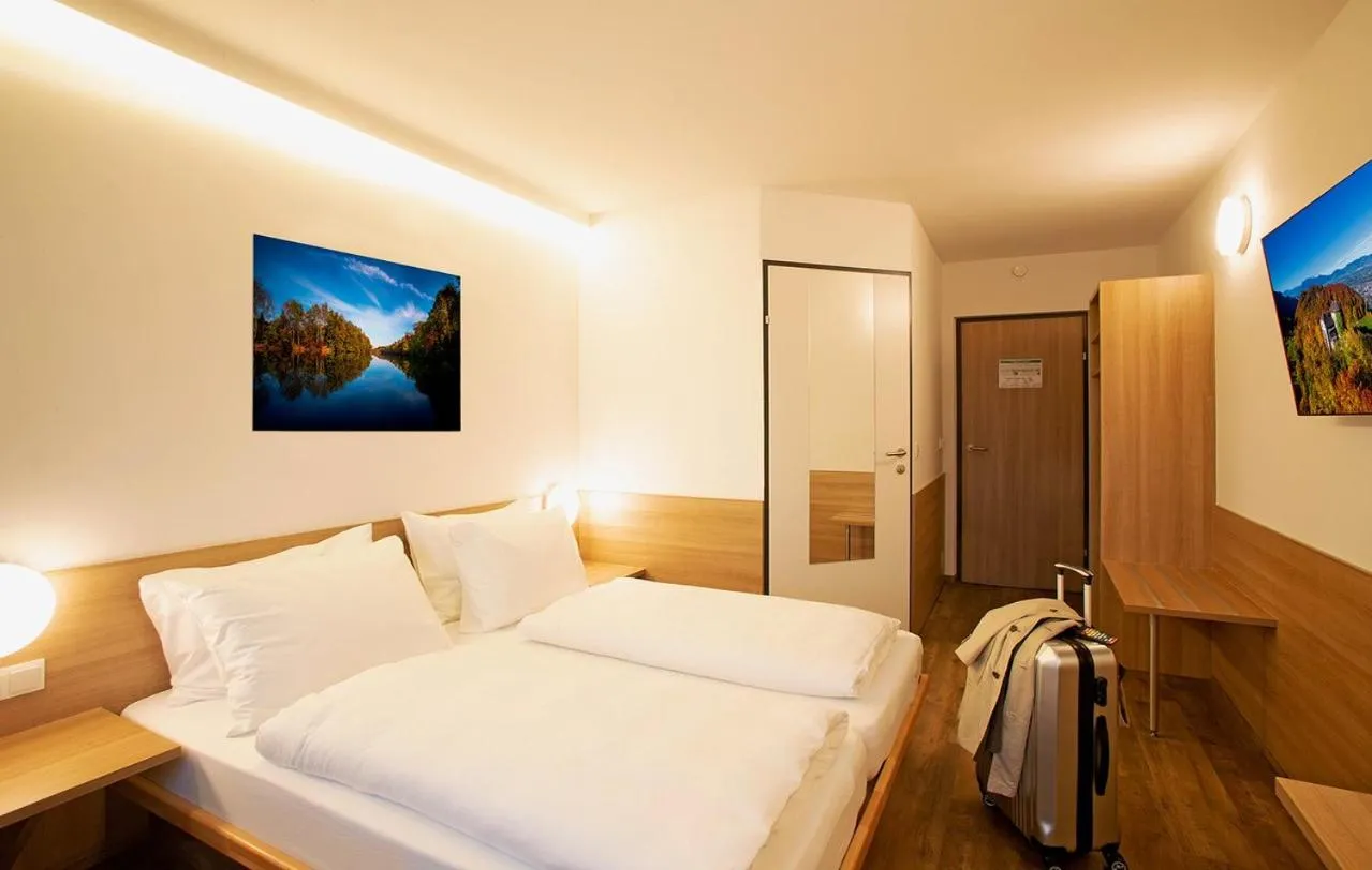 Photo of the whole room, Bed in OEKOTEL Hohenems