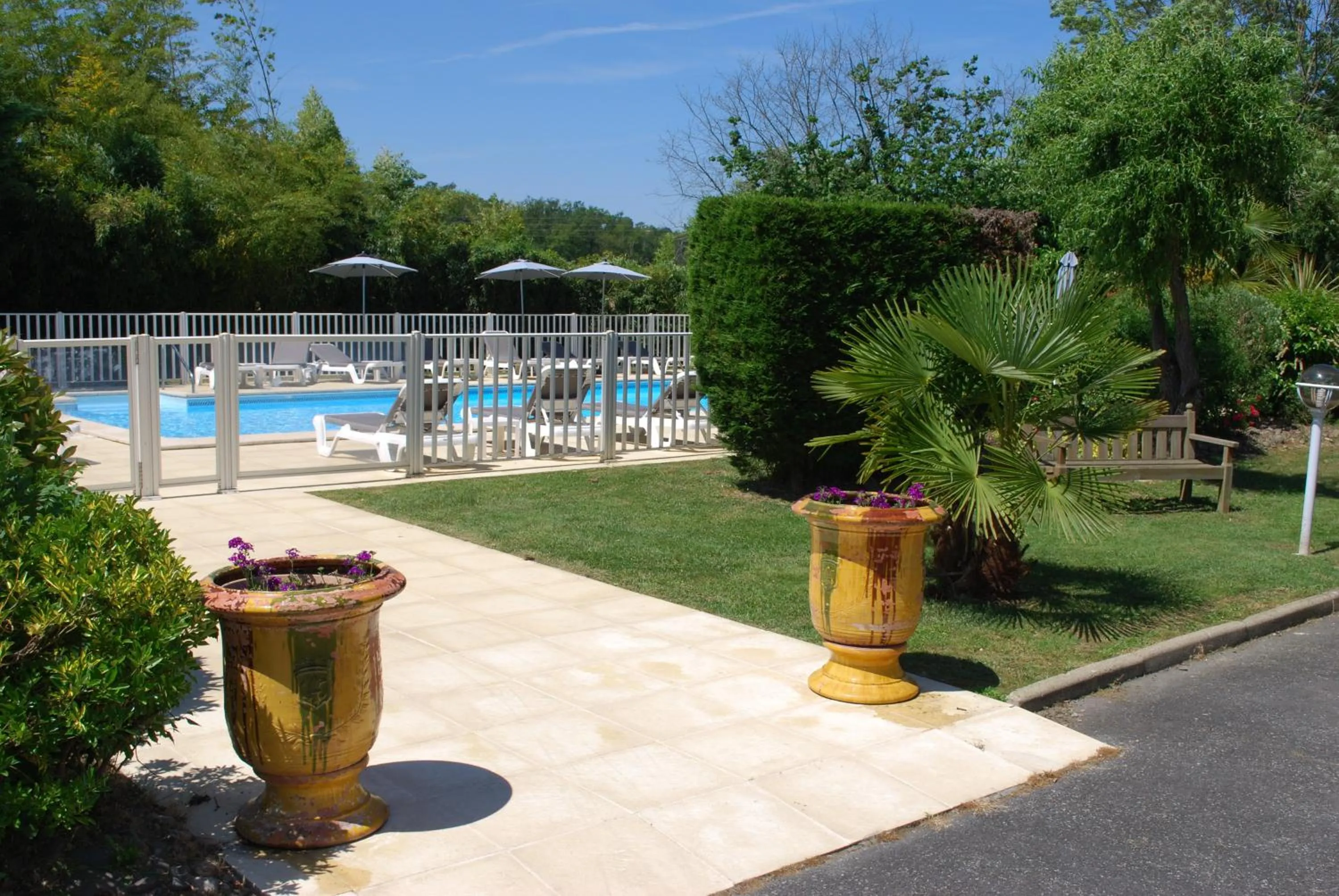 Swimming pool in Hotel Le Relais des Champs