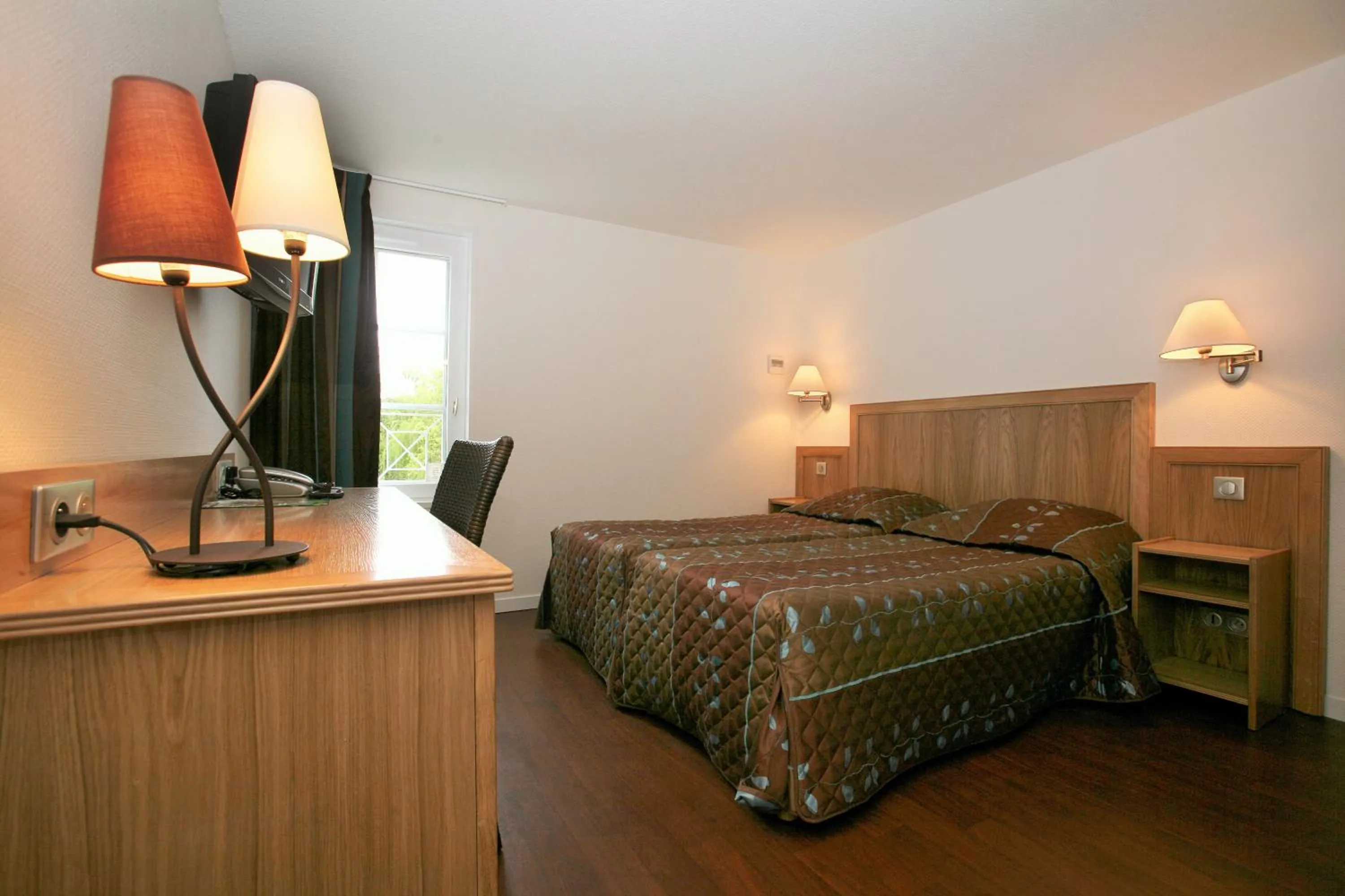 Bed in Hotel Le Relais des Champs