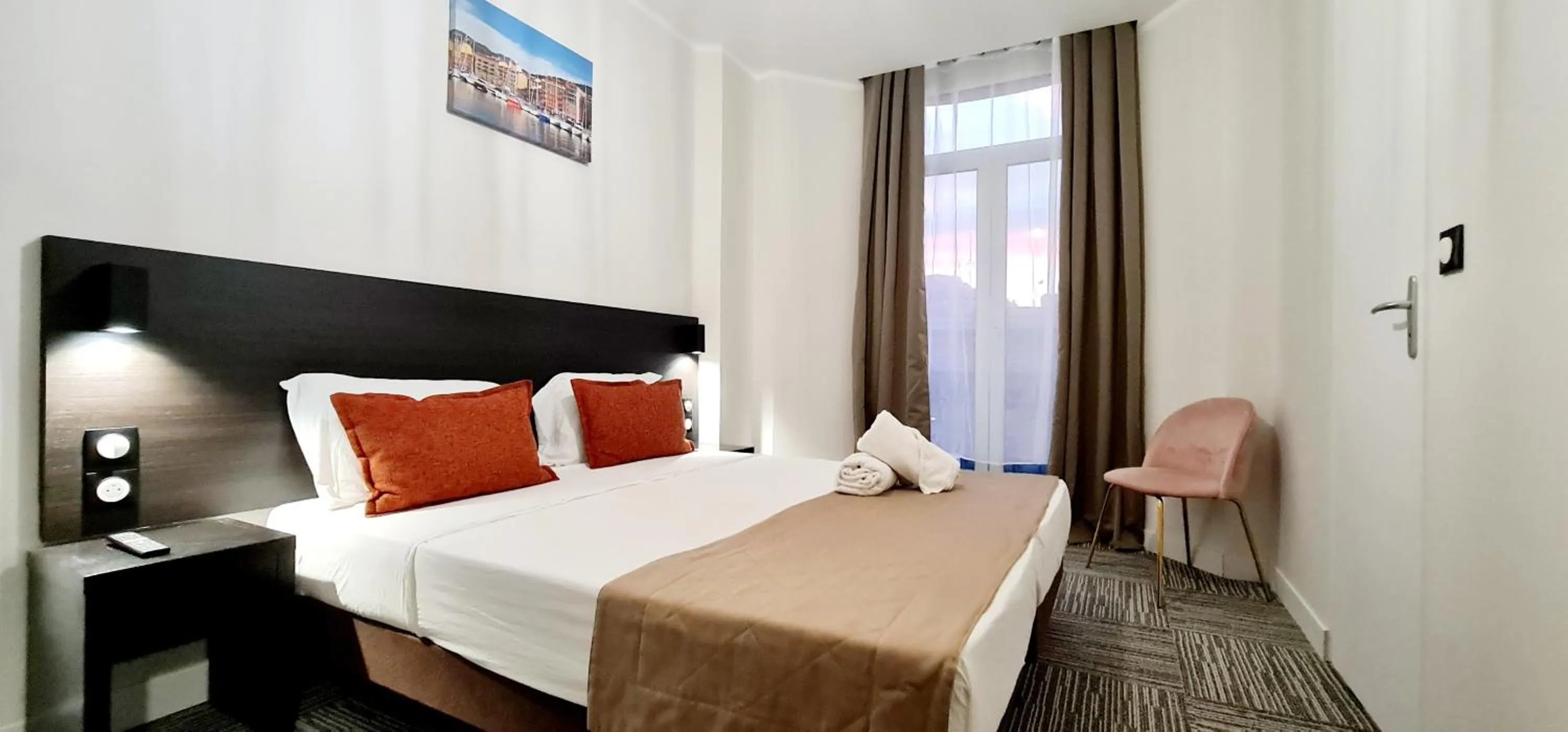 Bed in Evelia Hotels