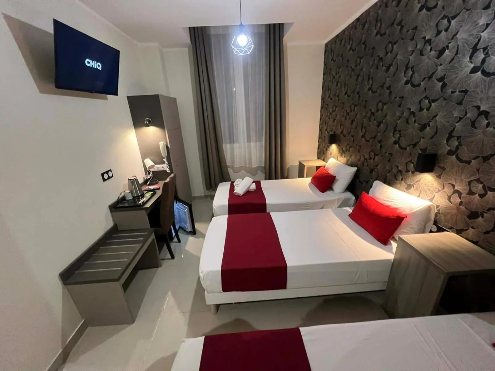 Bed in Evelia Hotels