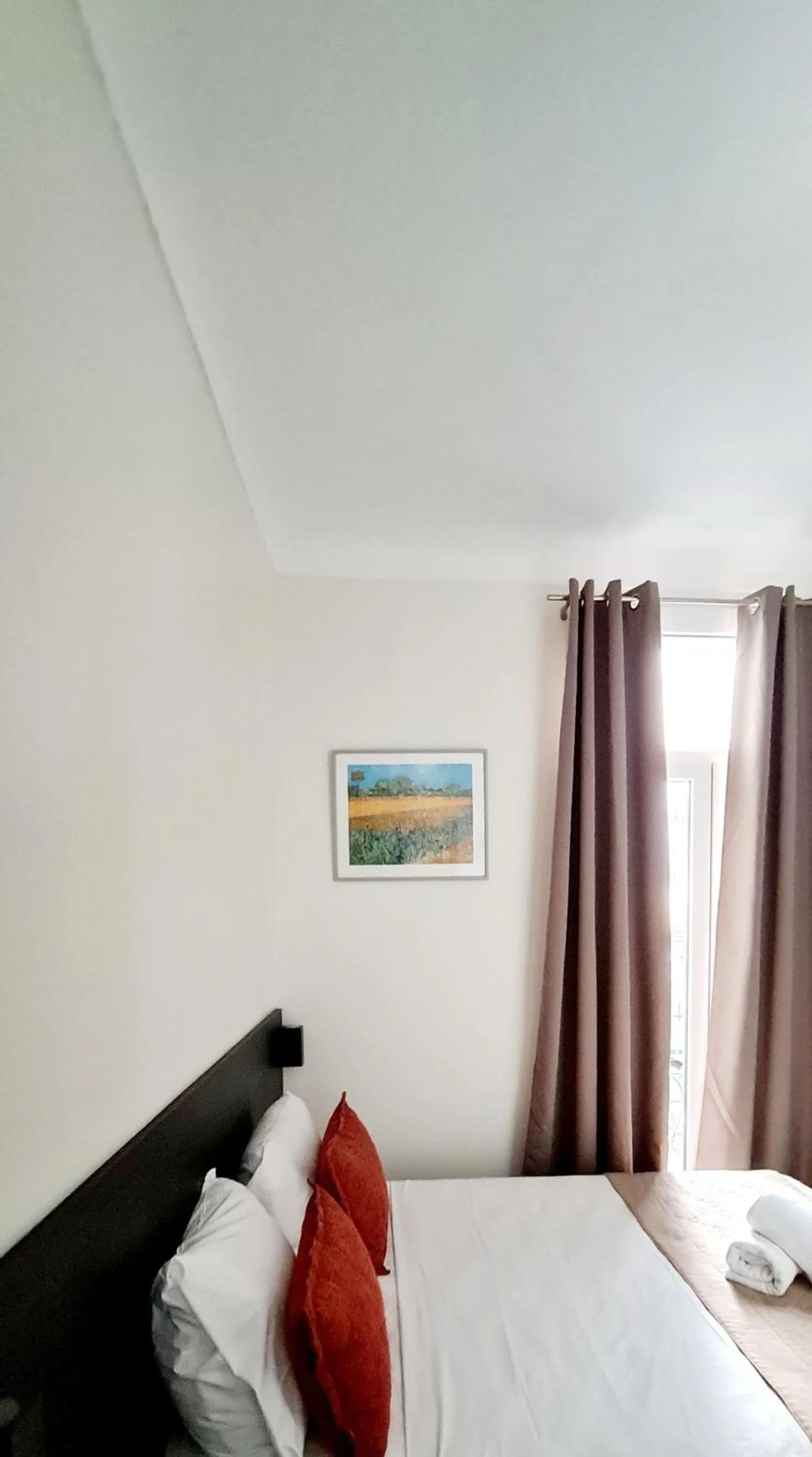 Bed in Evelia Hotels