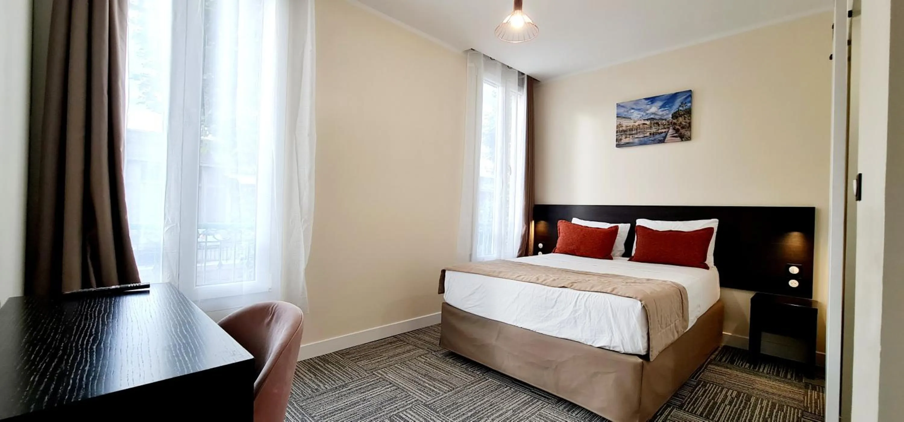 Bed in Evelia Hotels