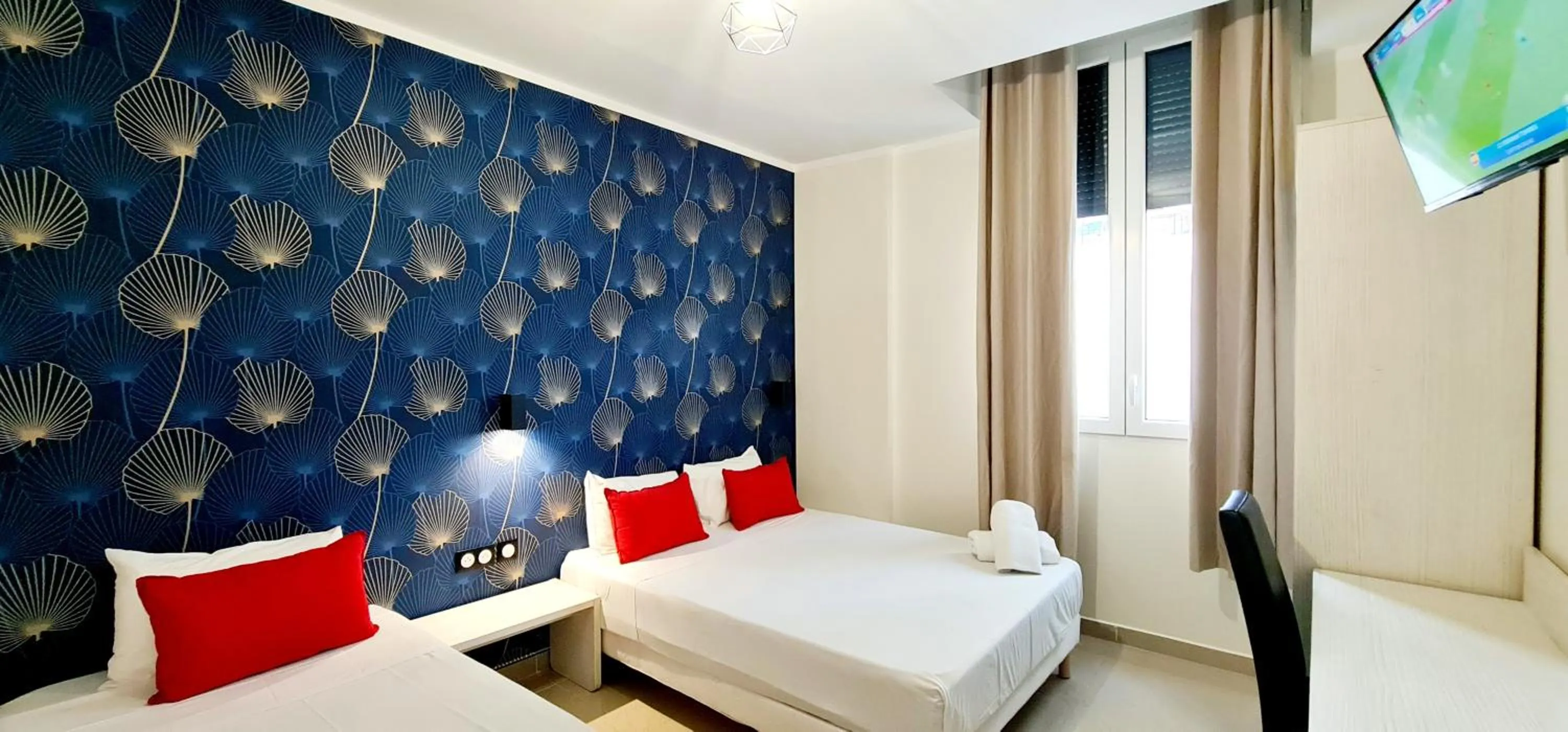 Bed in Evelia Hotels