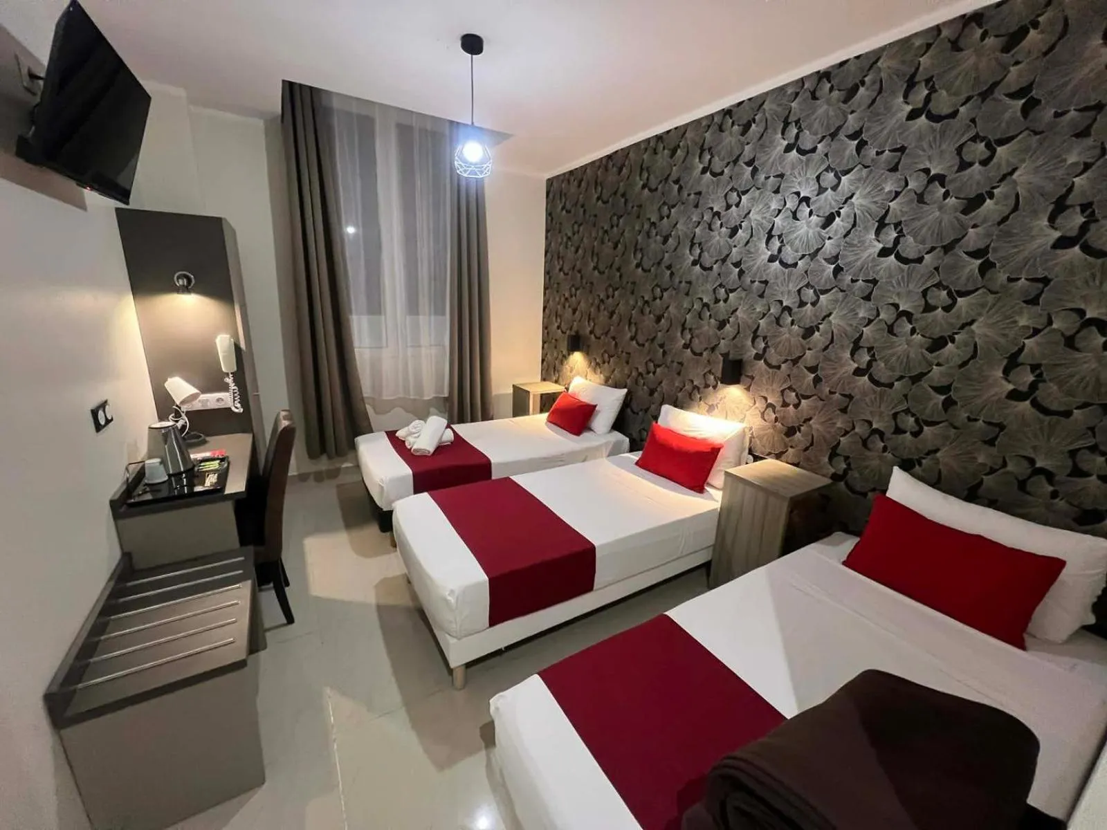 Bed in Evelia Hotels