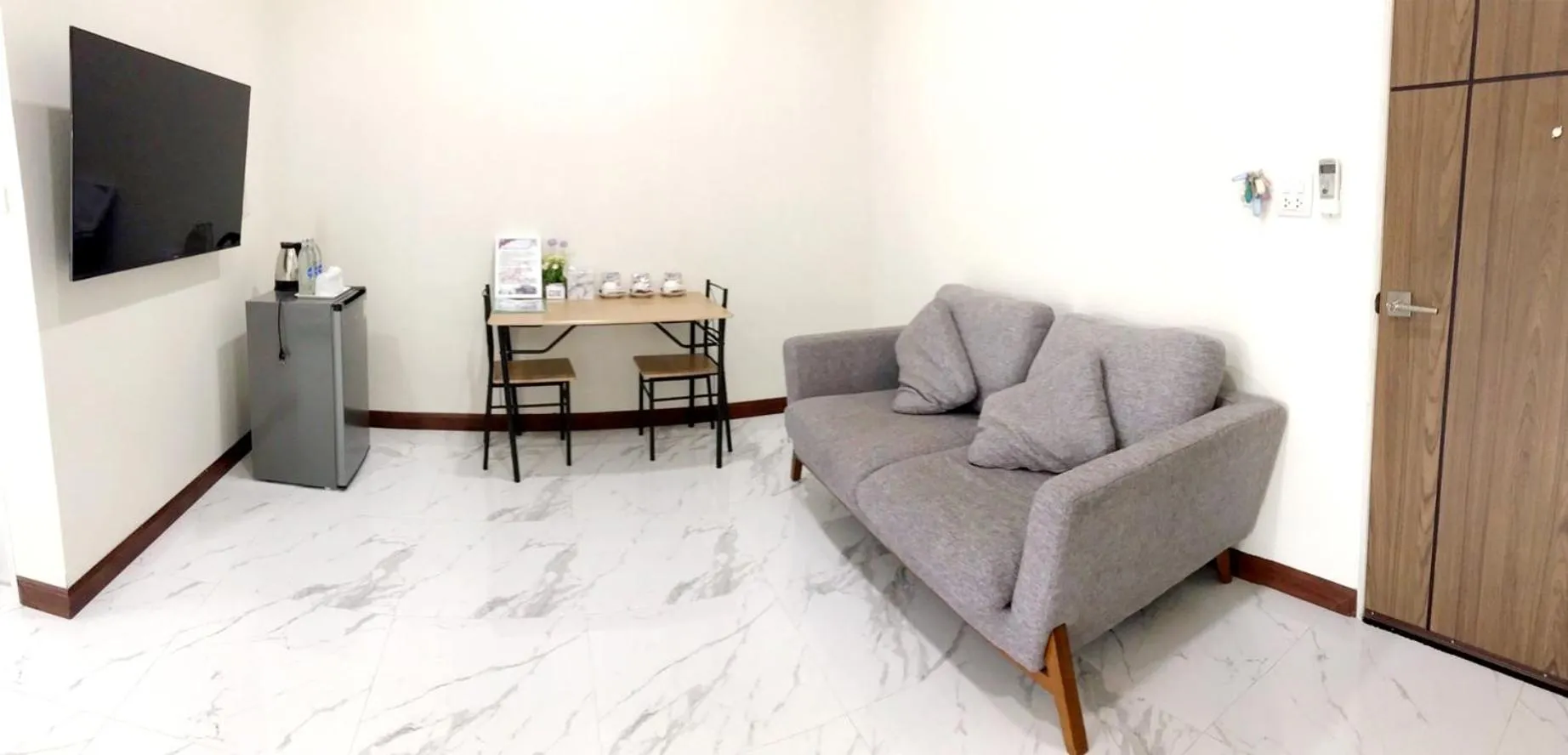 Communal lounge/ TV room in Park Villa Chaiyaphume