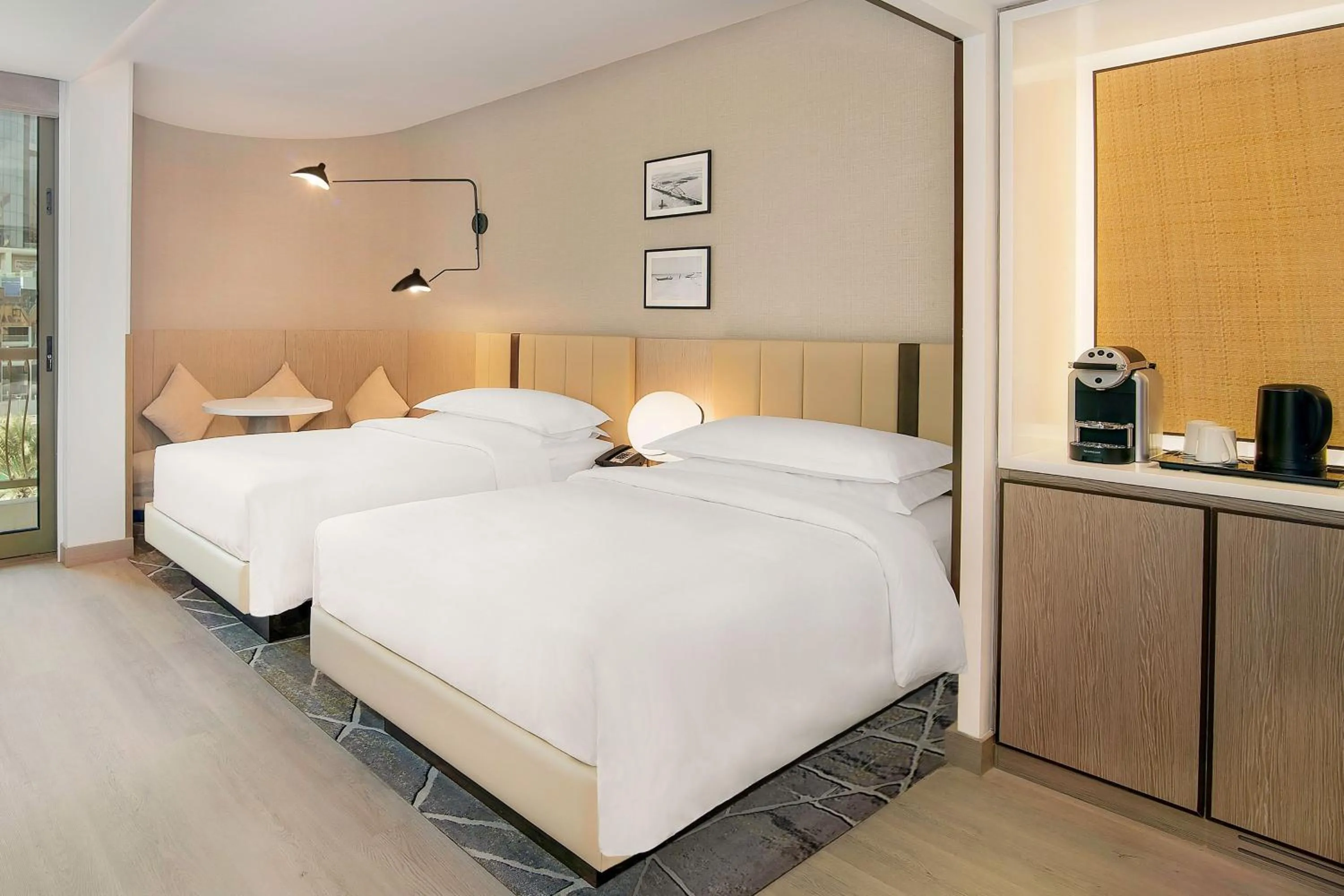 Photo of the whole room, Bed in Sheraton Abu Dhabi Hotel & Resort