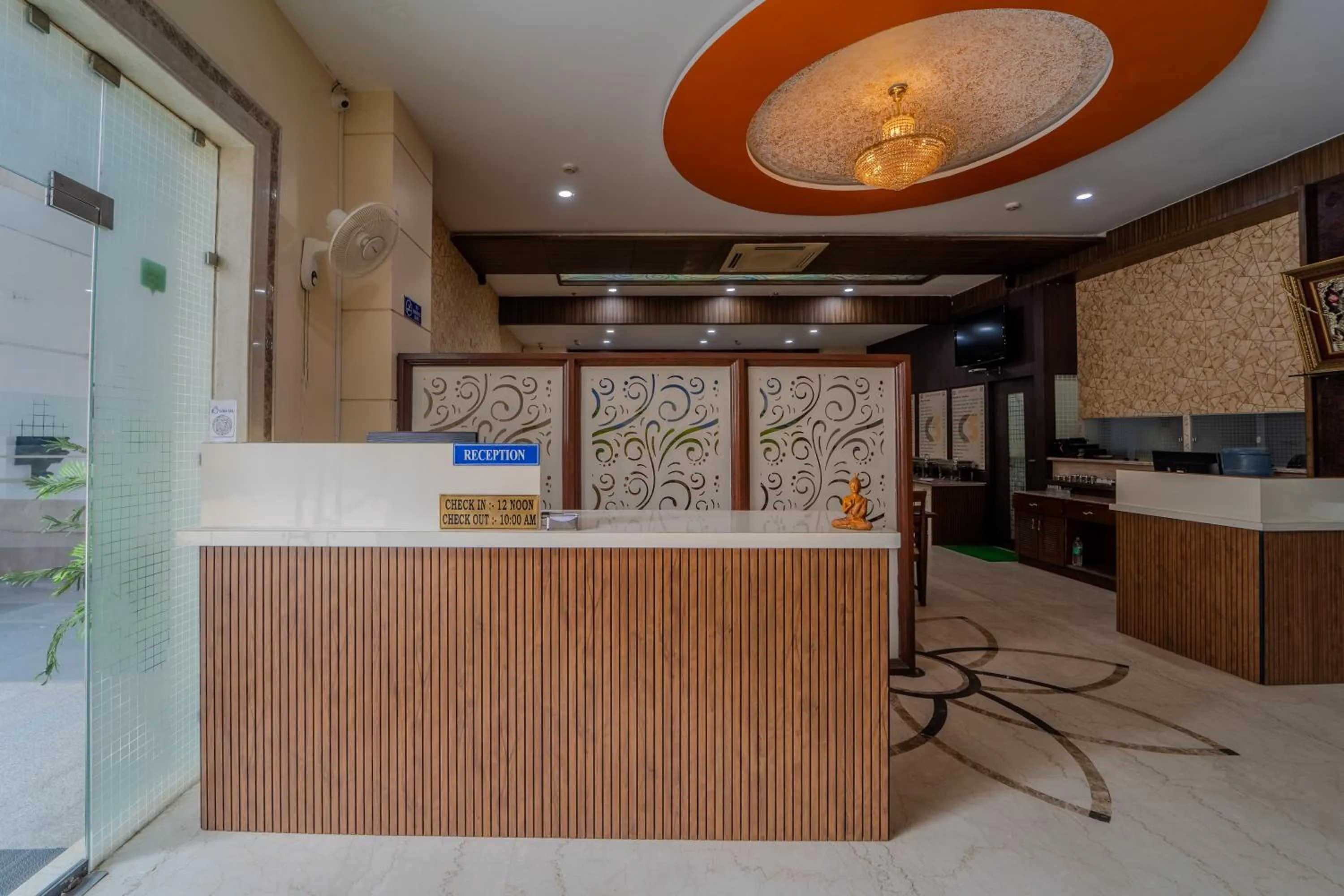 Lobby or reception in Hotel City Square By KeyMagics