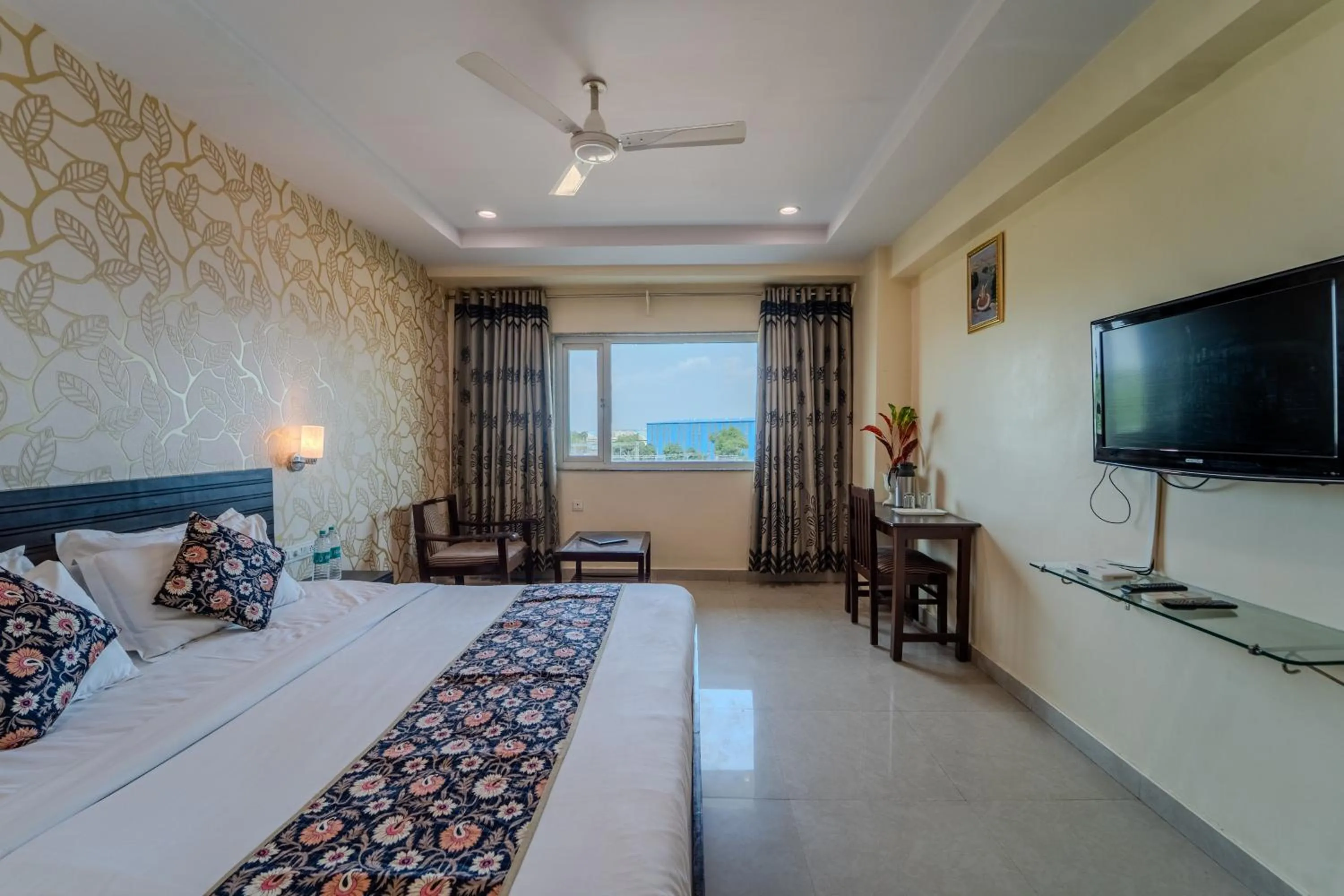 Photo of the whole room, Bed in Hotel City Square By KeyMagics