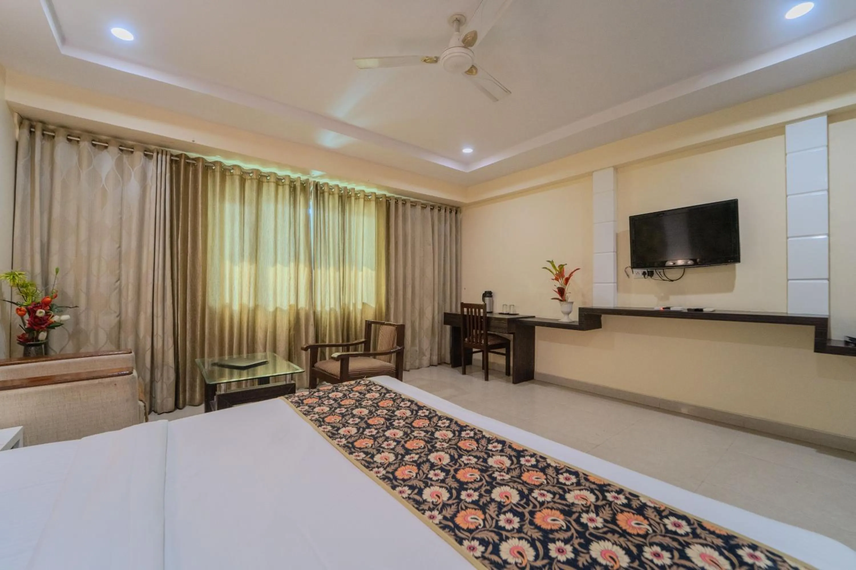 Photo of the whole room, Bed in Hotel City Square By KeyMagics