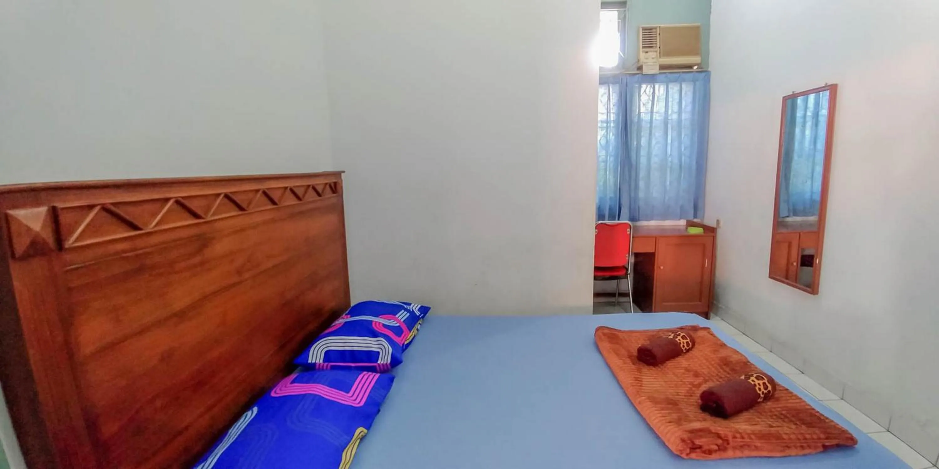 Bed in Hotel Rajawali Mitra RedDoorz