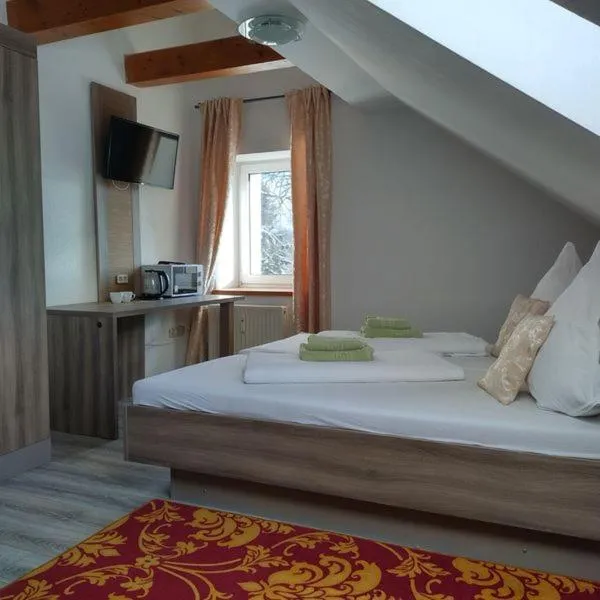 Bed in Pension Goldenes Vogtland