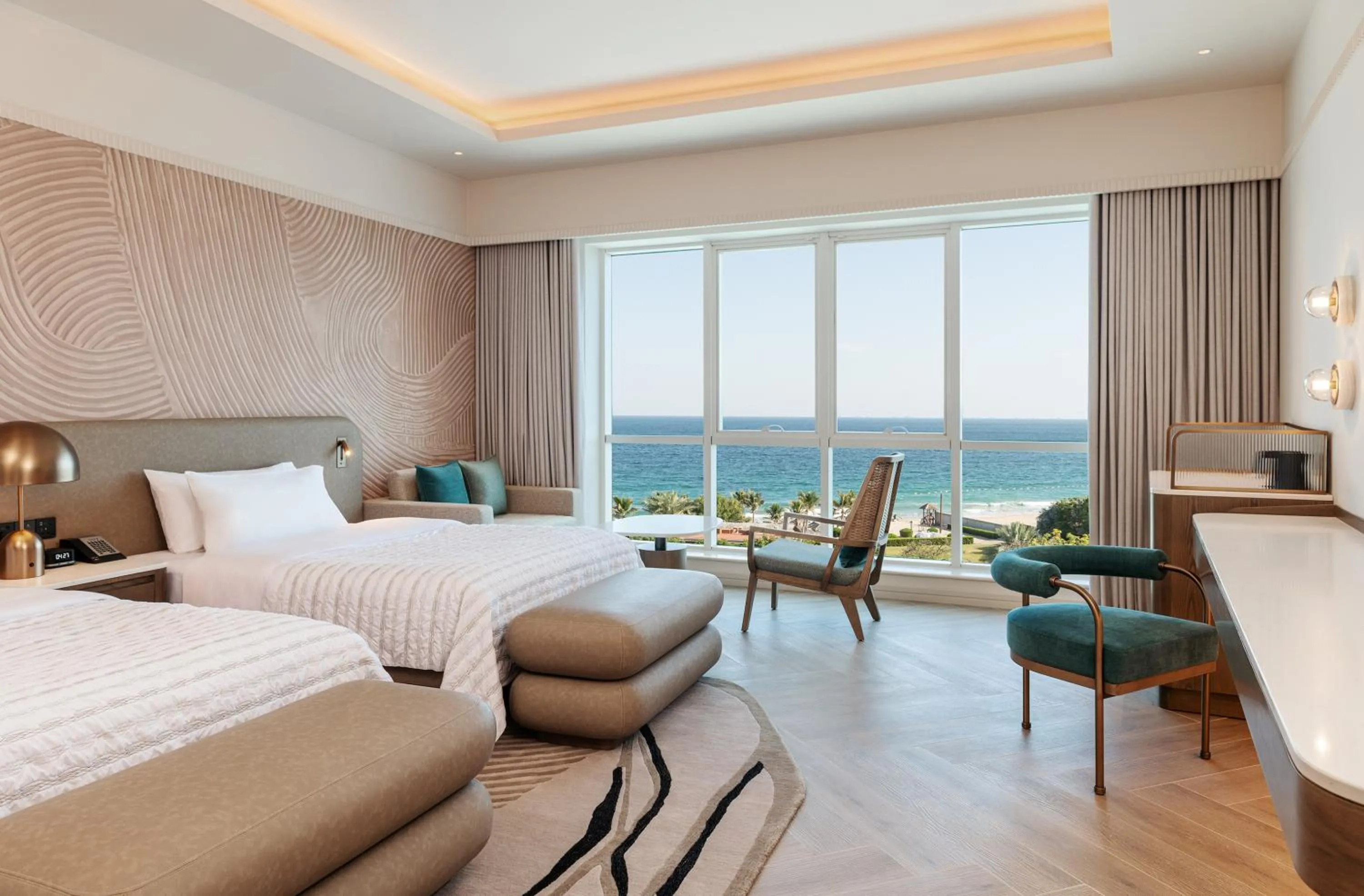 Bed in Le Meridien Al Aqah Beach Resort