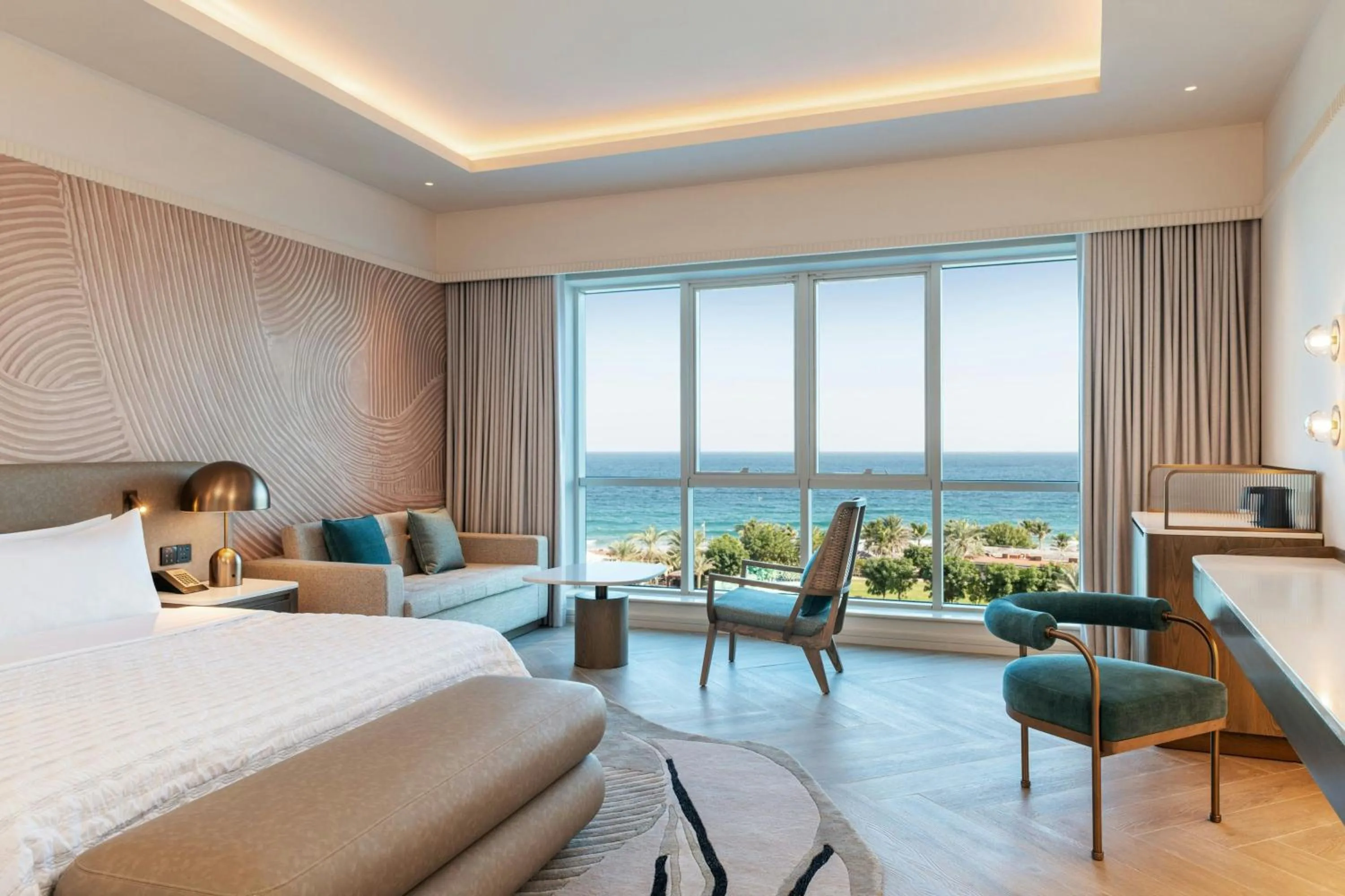 Photo of the whole room, Bed in Le Meridien Al Aqah Beach Resort