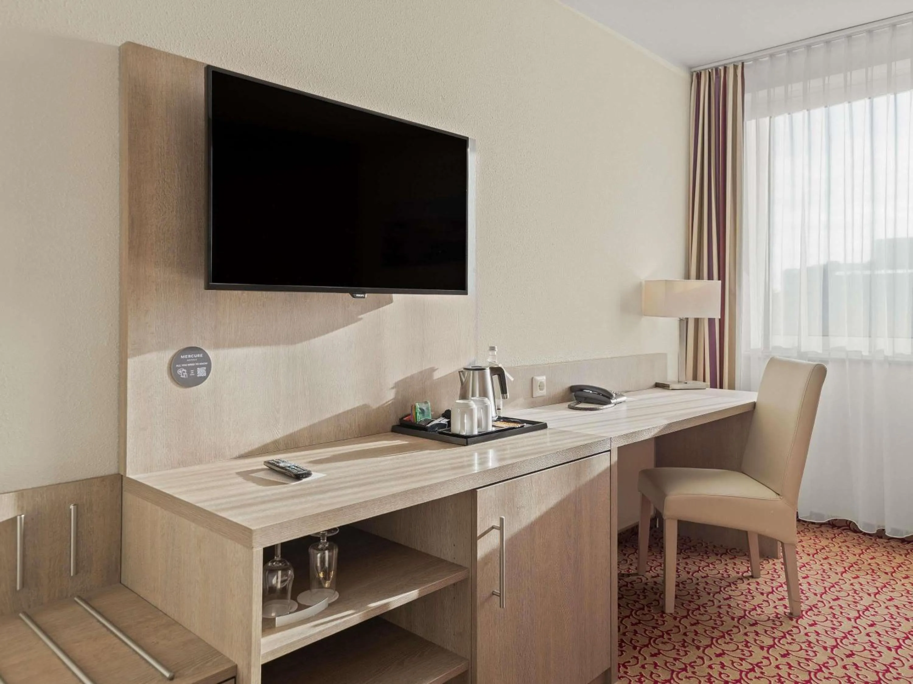 Bedroom in Mercure Hotel Hamburg am Volkspark