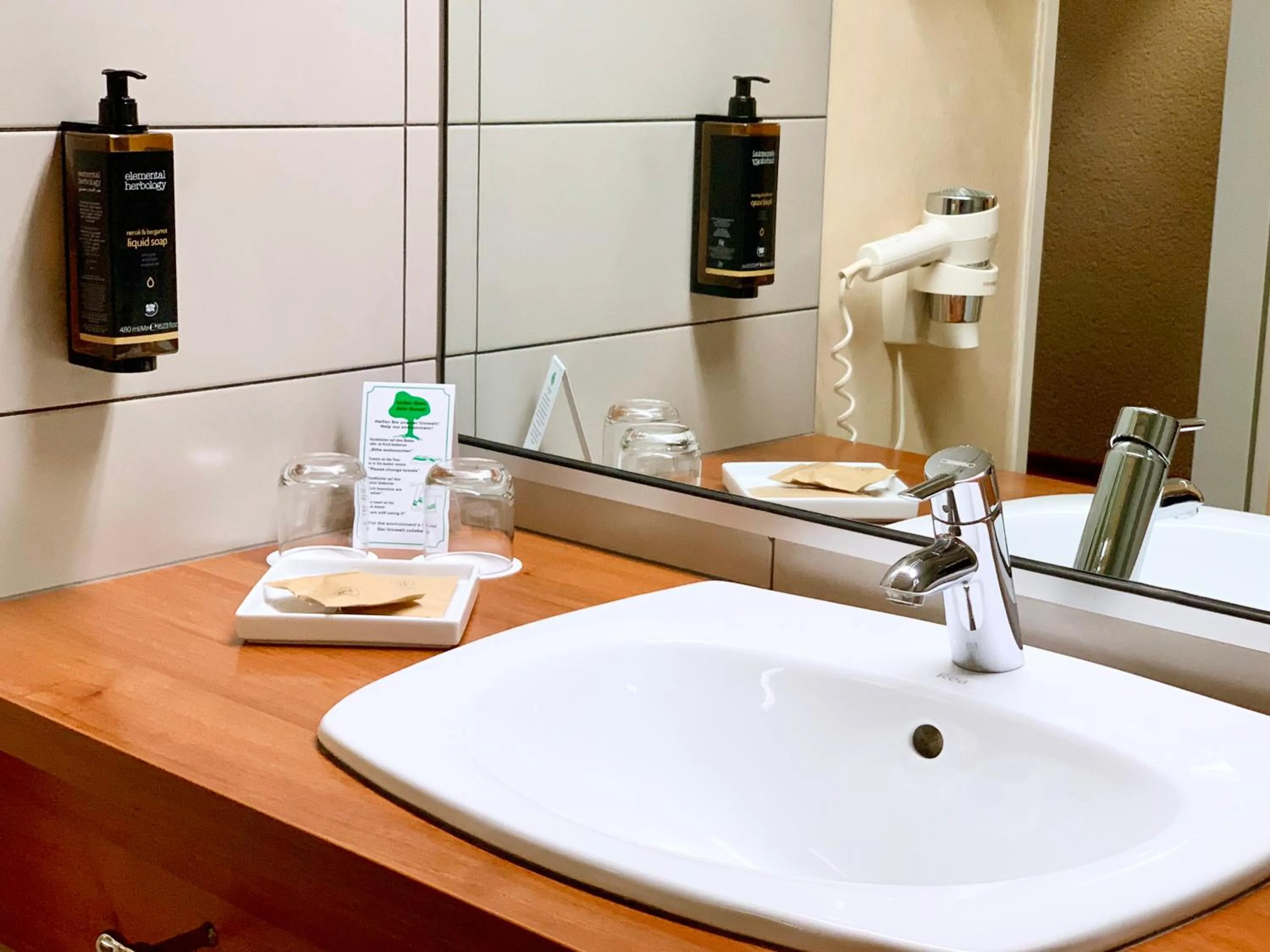 Bathroom in Mercure Hotel Hamburg am Volkspark