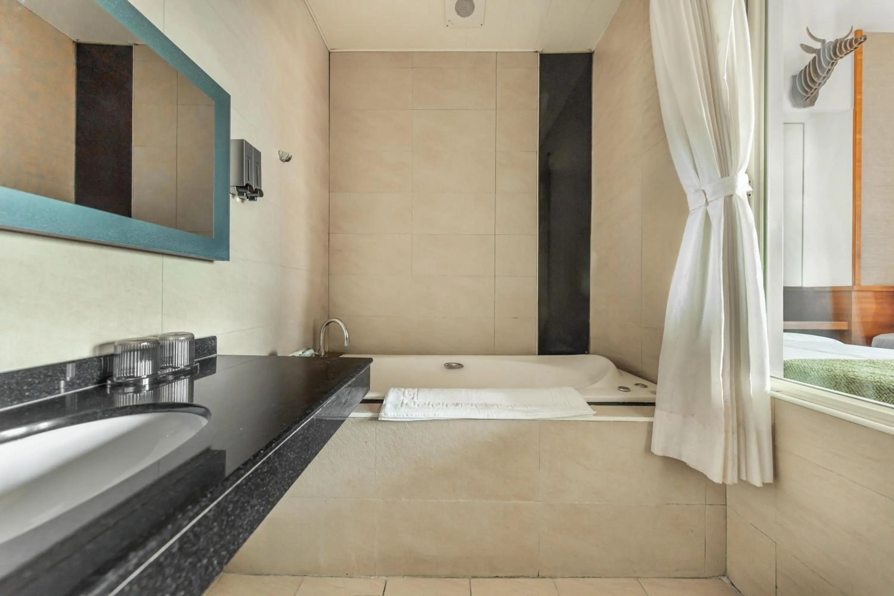 Bathroom in ItaThao Vacation Inn with Elevator