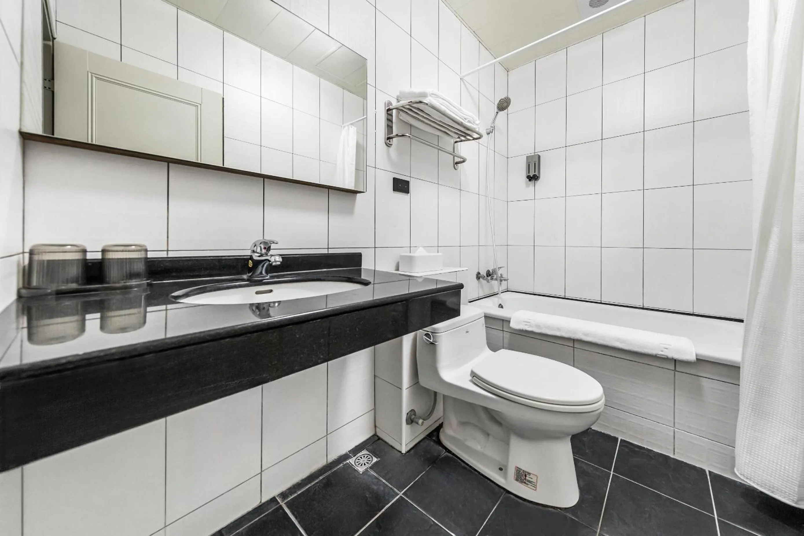 Bathroom in ItaThao Vacation Inn with Elevator