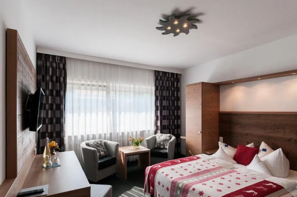 Bed in Hotel Alpensonne