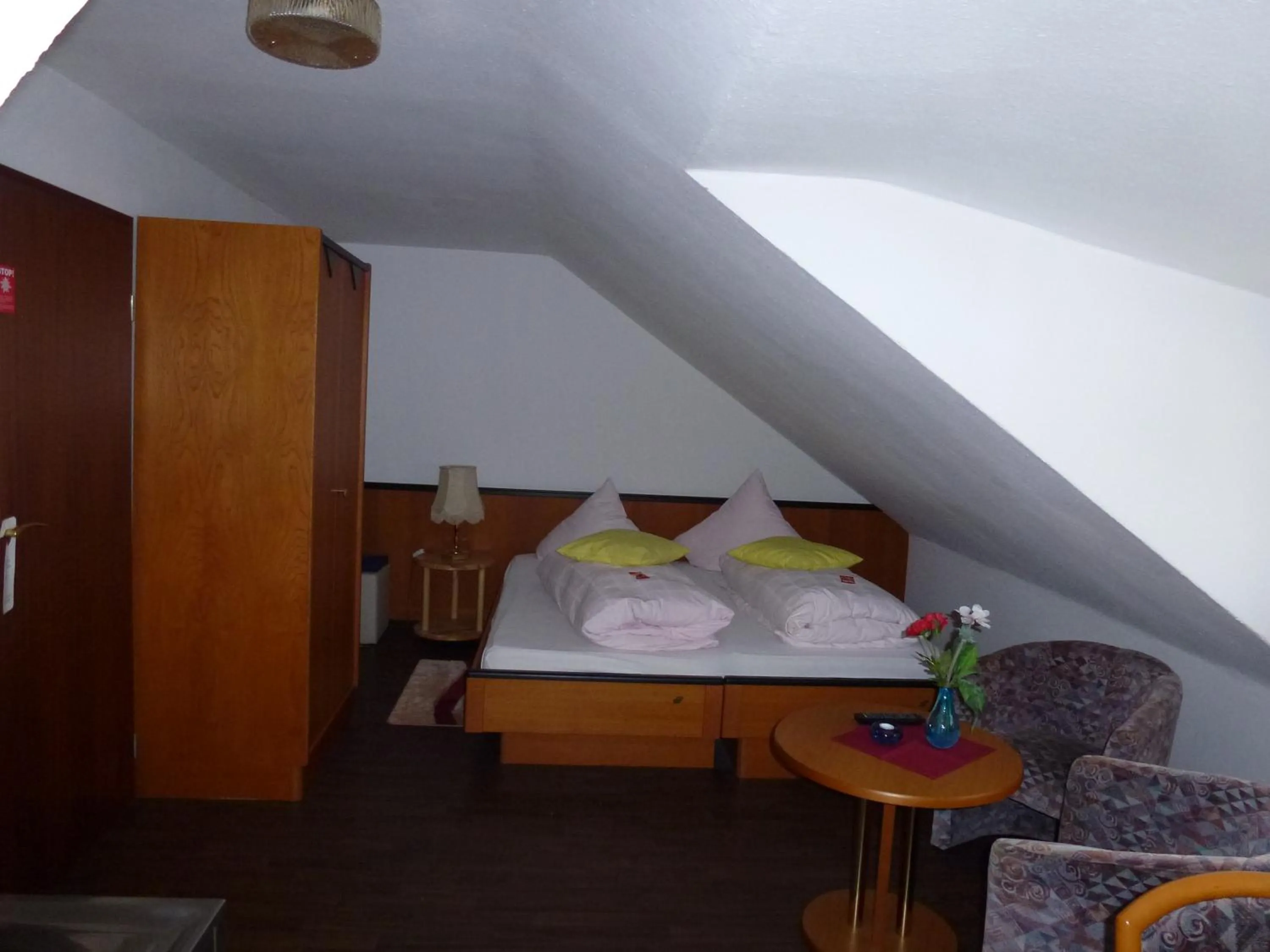 Bed in Hotel Wildunger Hof mit Gemeinschaftsküche