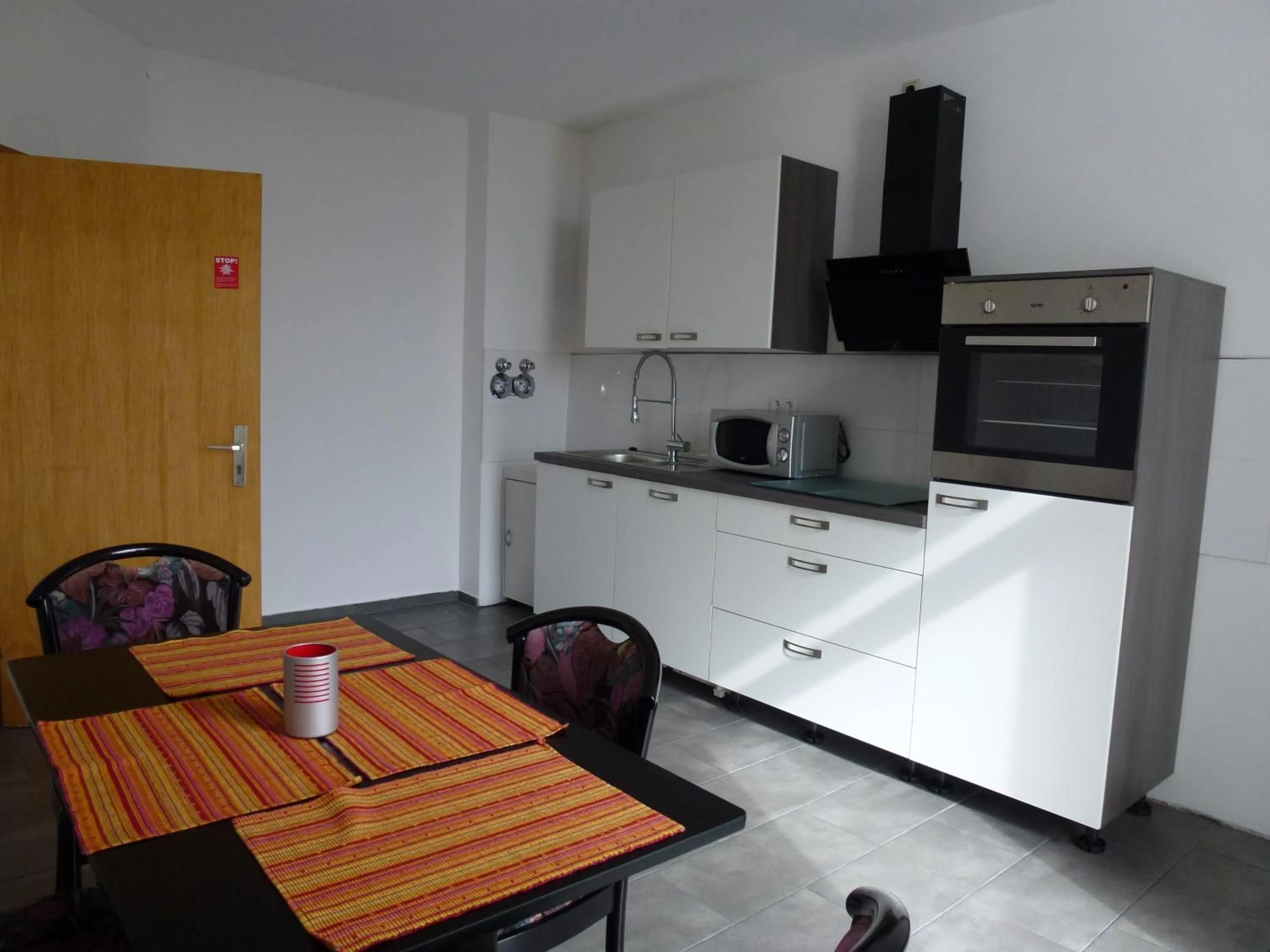 Kitchen or kitchenette in Hotel Wildunger Hof mit Gemeinschaftsküche