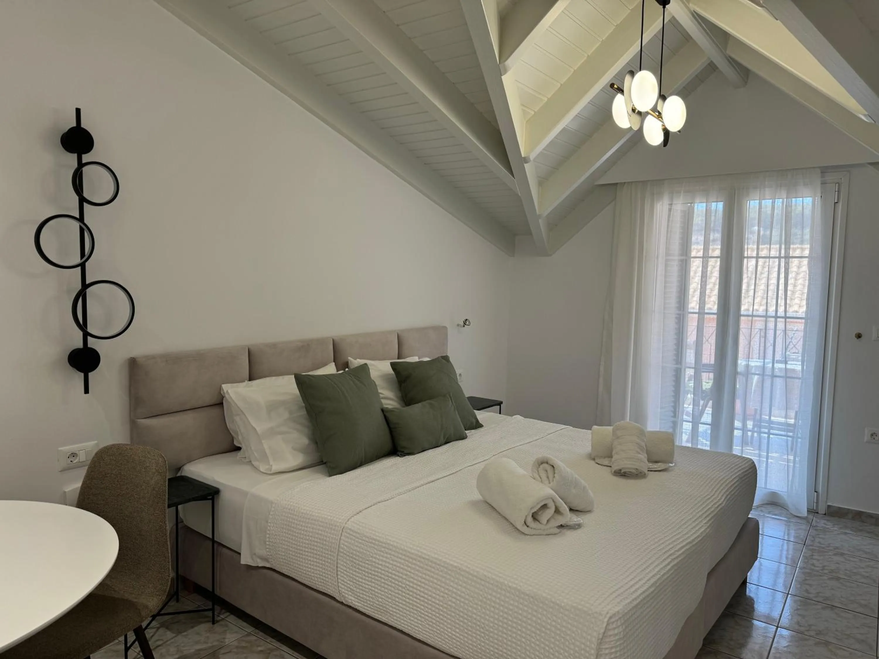 Bed in Rouchotas Apartments