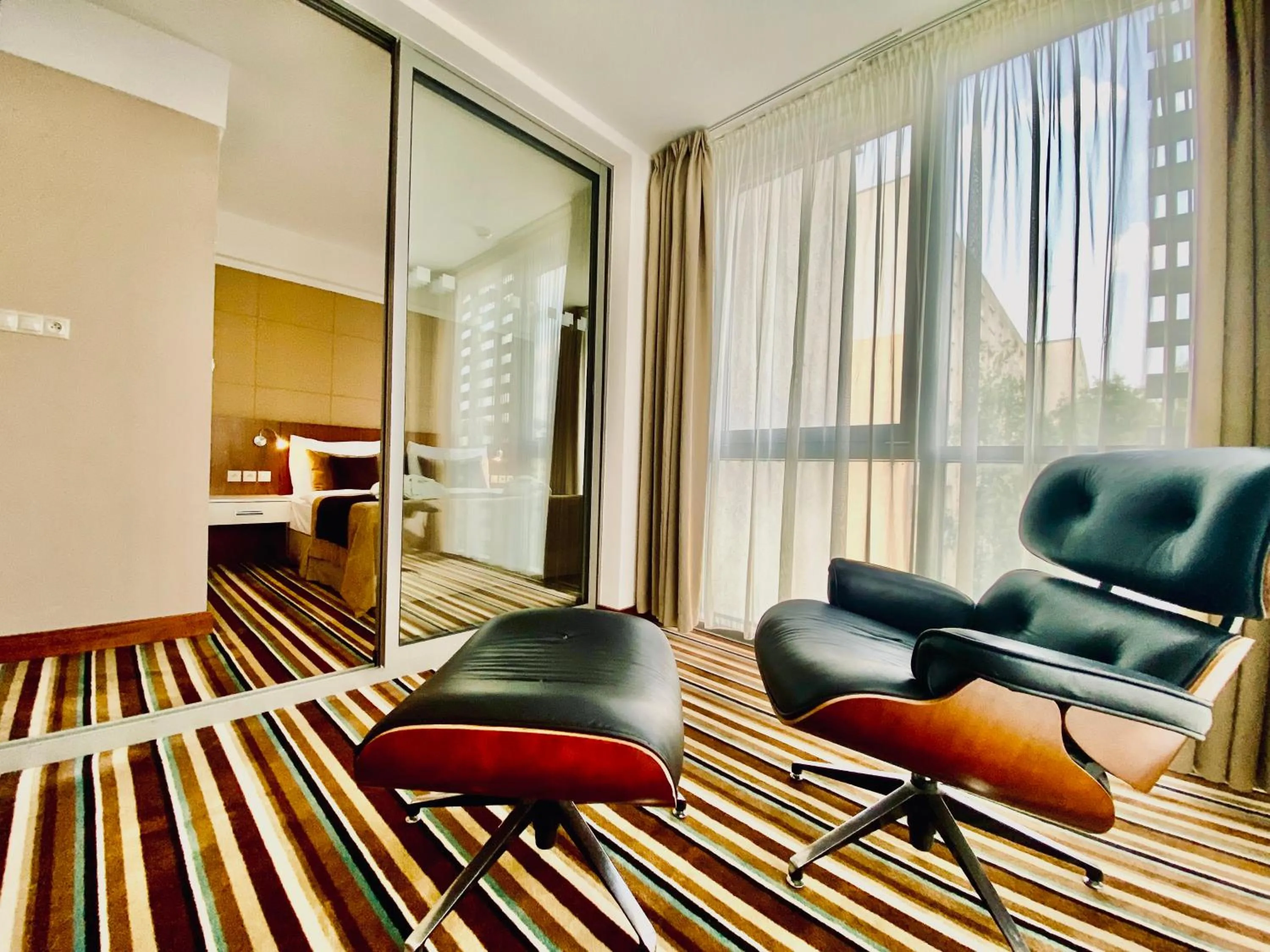 Seating area in Business Hotel Astrum Laus