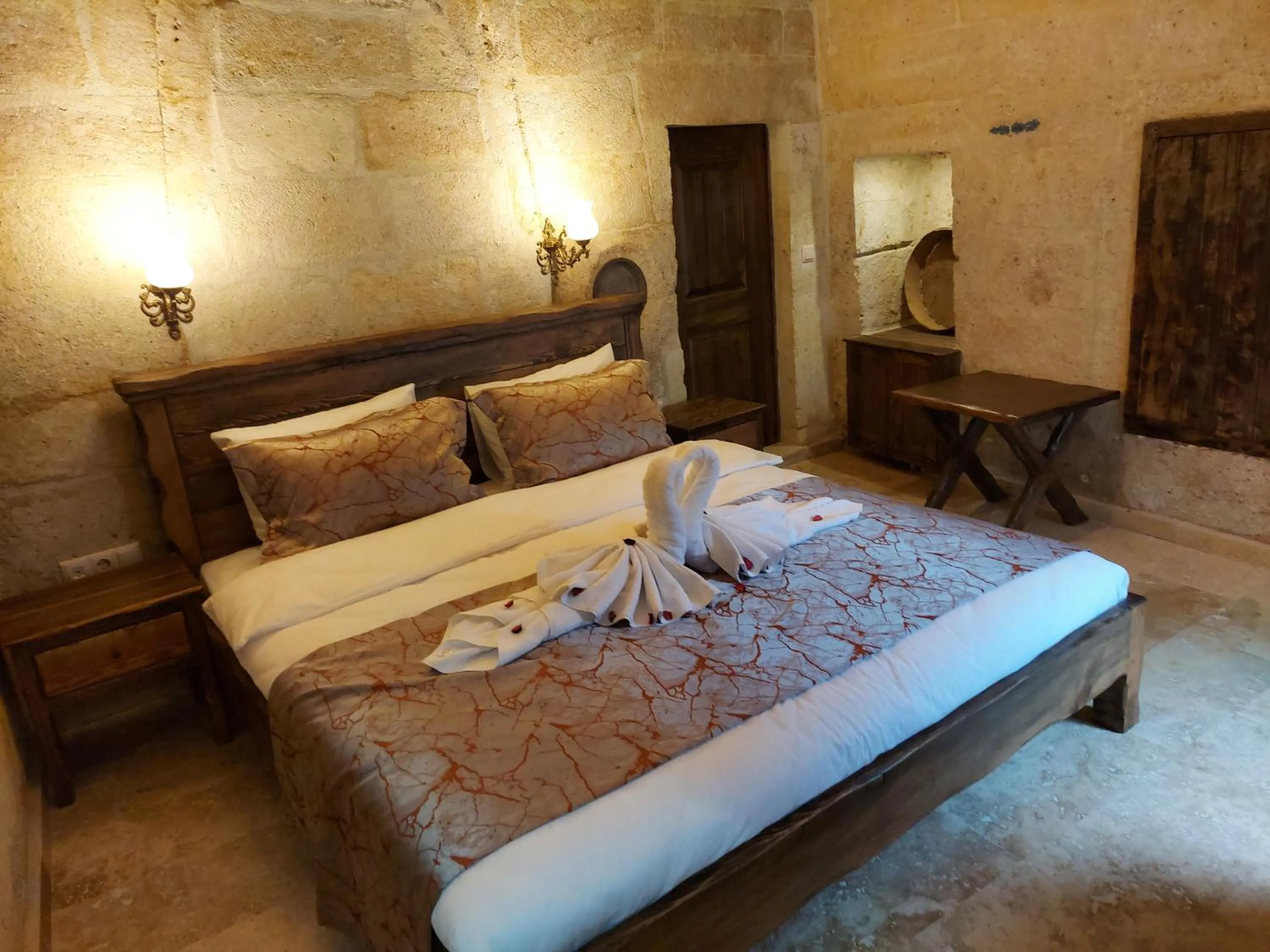 Bed in ARMEsos Cave Hotel
