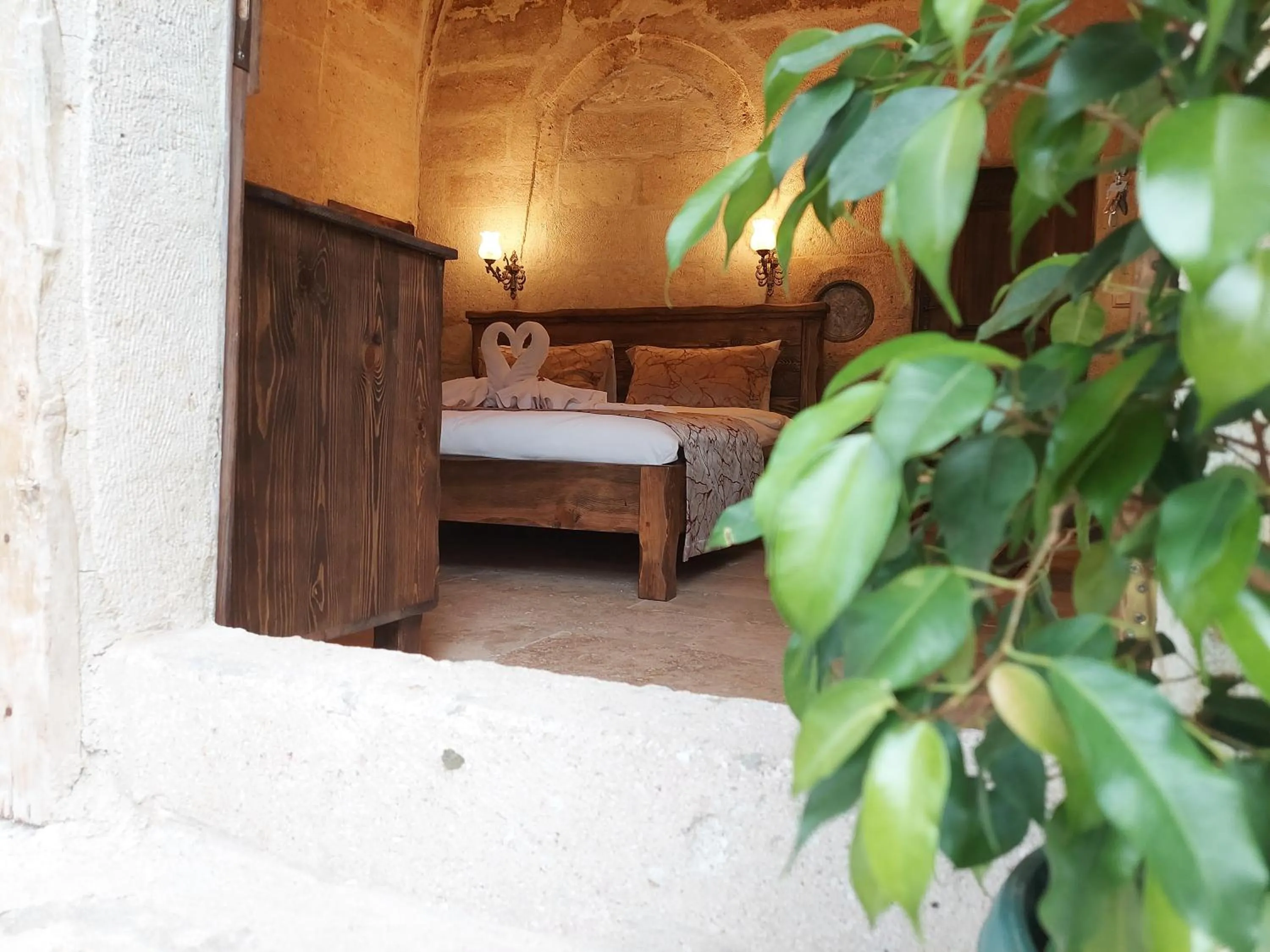 Bed in ARMEsos Cave Hotel