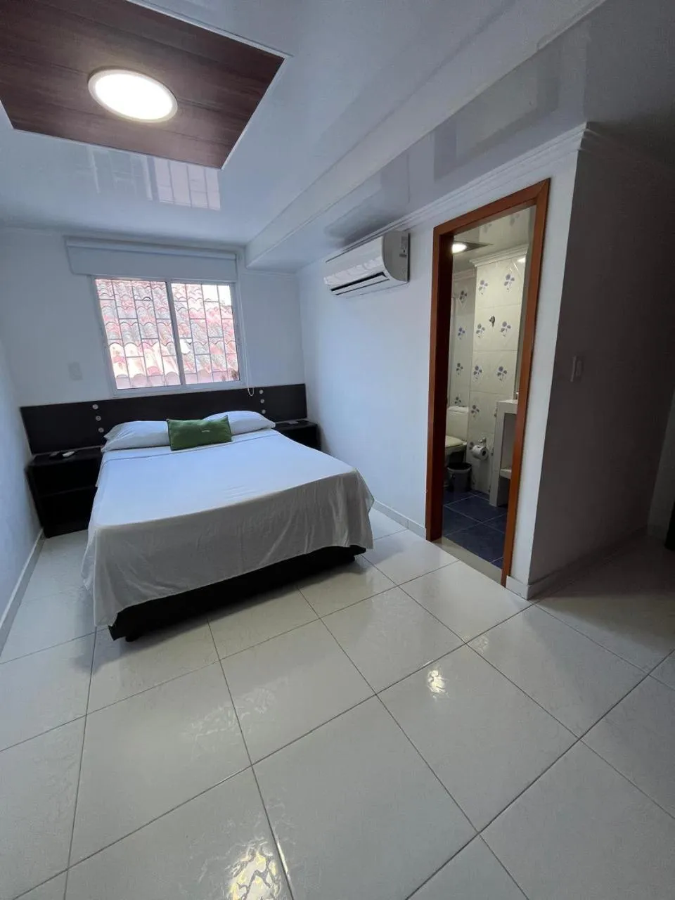 Bedroom, Bed in Villa Santos Apartaestudios