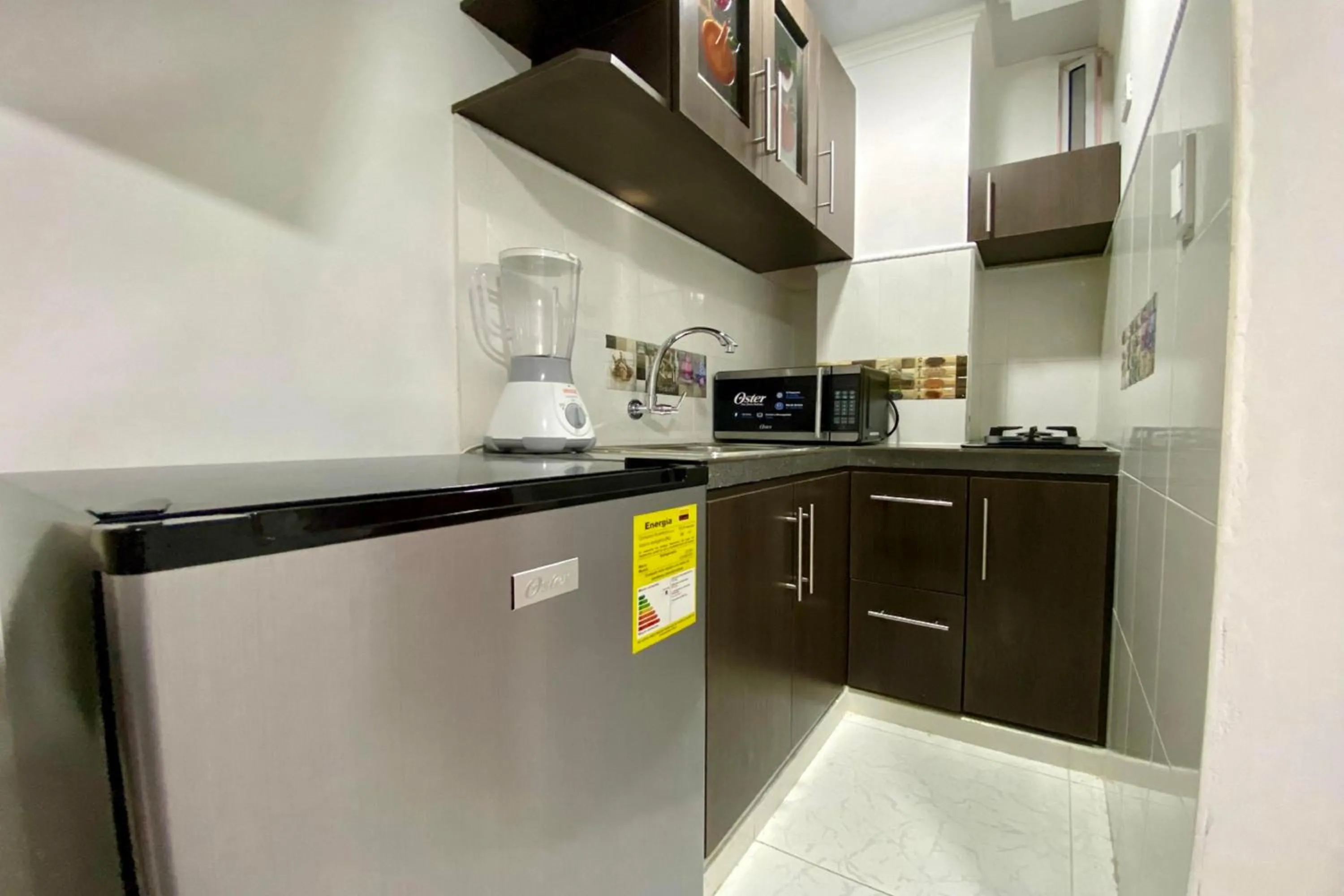 Kitchen or kitchenette in Villa Santos Apartaestudios