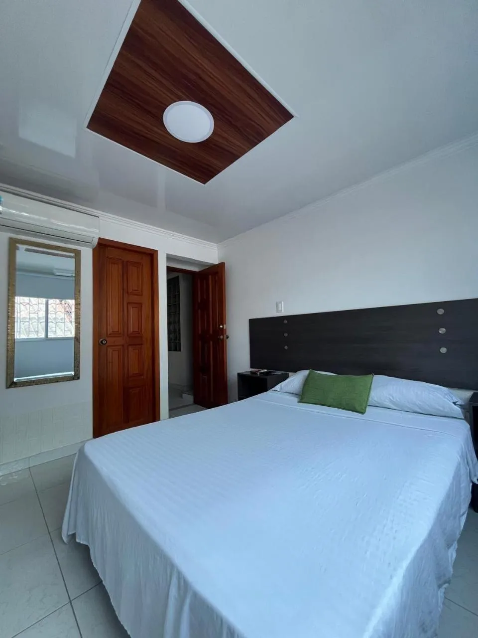 Bed in Villa Santos Apartaestudios