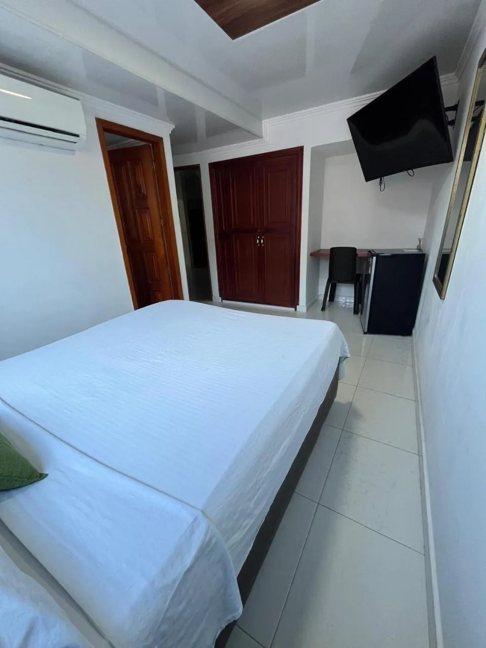 Bedroom, Bed in Villa Santos Apartaestudios