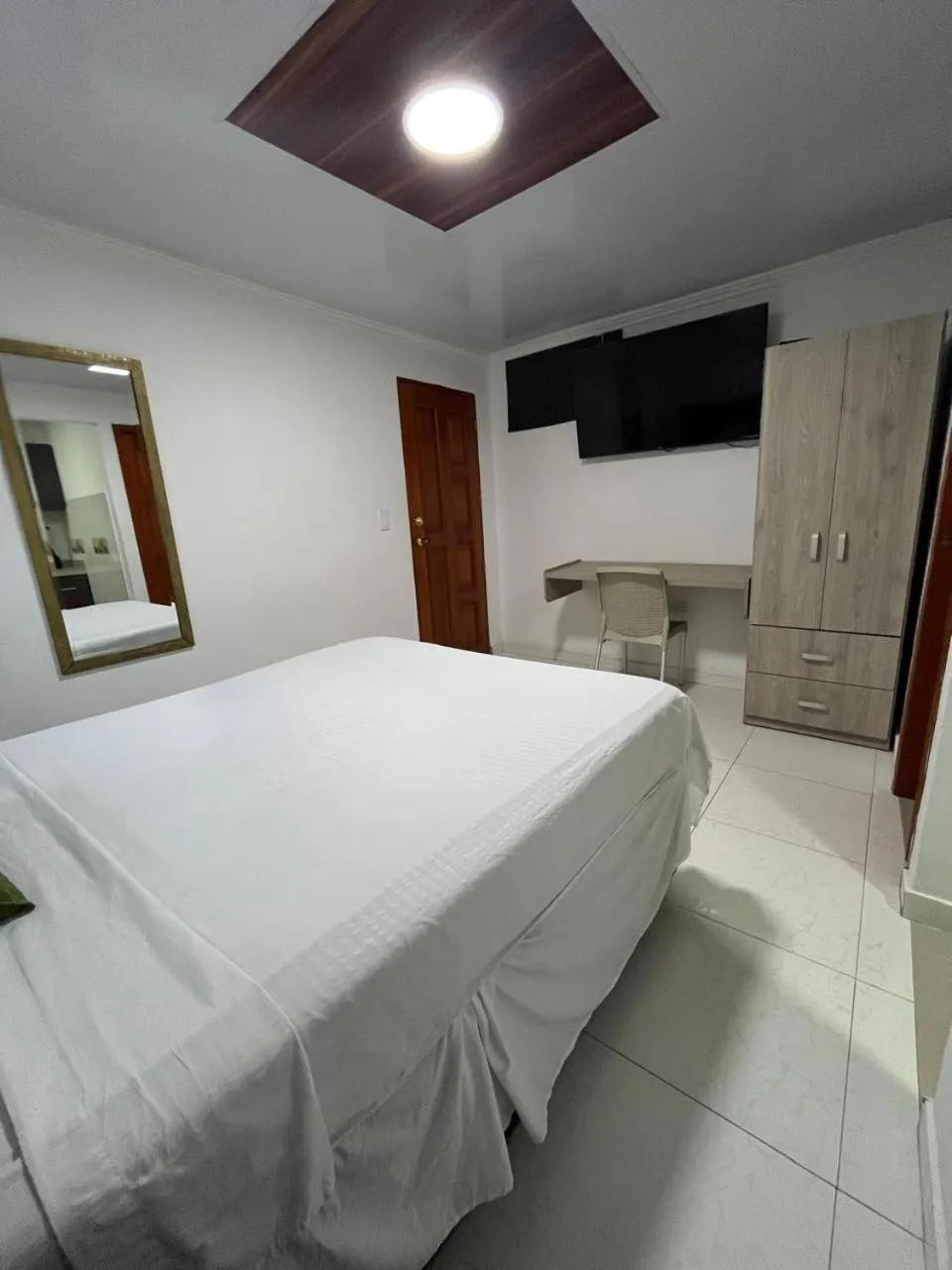 Bed in Villa Santos Apartaestudios