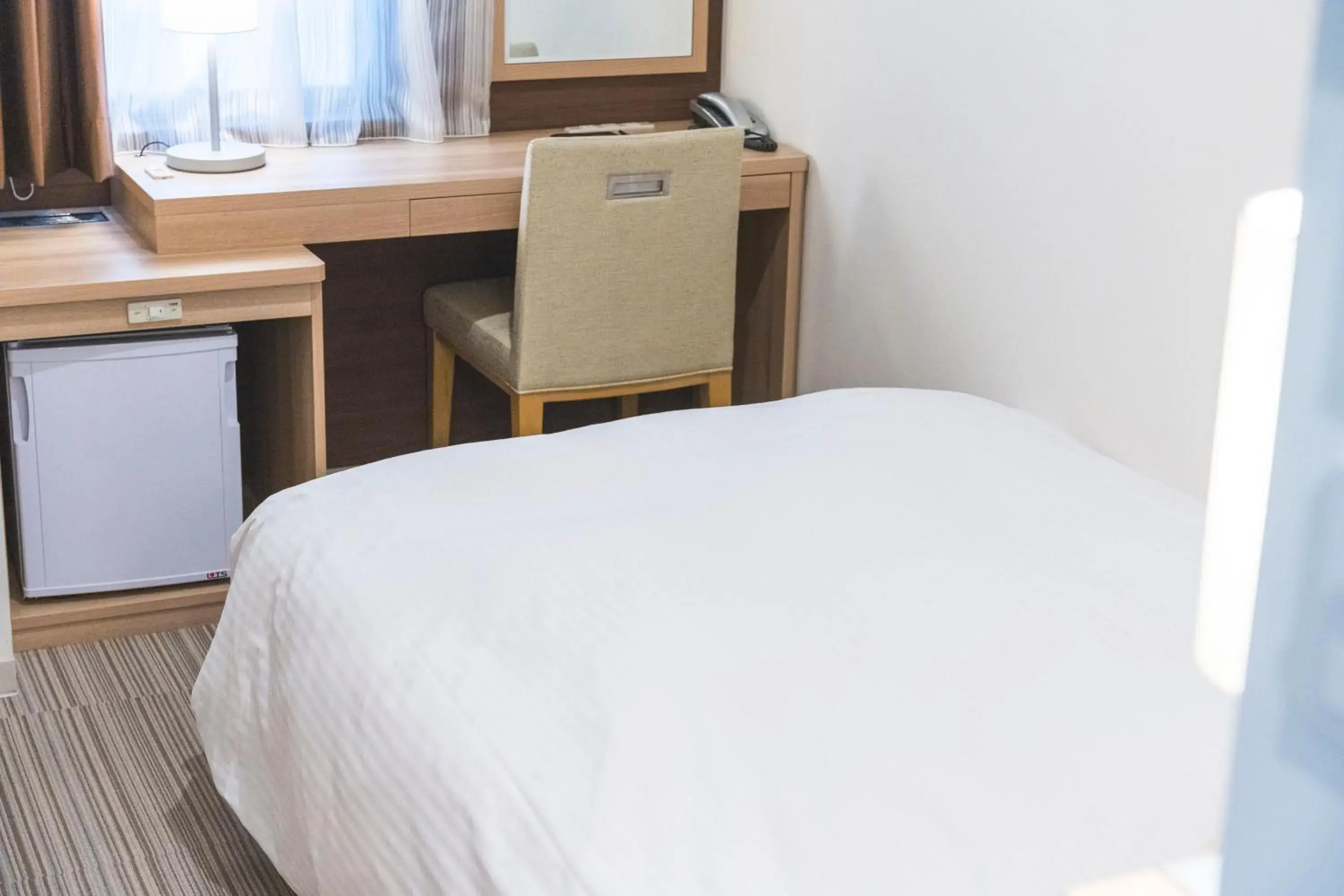 Photo of the whole room, Bed in KOKO HOTEL Hiroshima Ekimae Photo of the whole room, Bed in KOKO HOTEL Hiroshima Ekimae