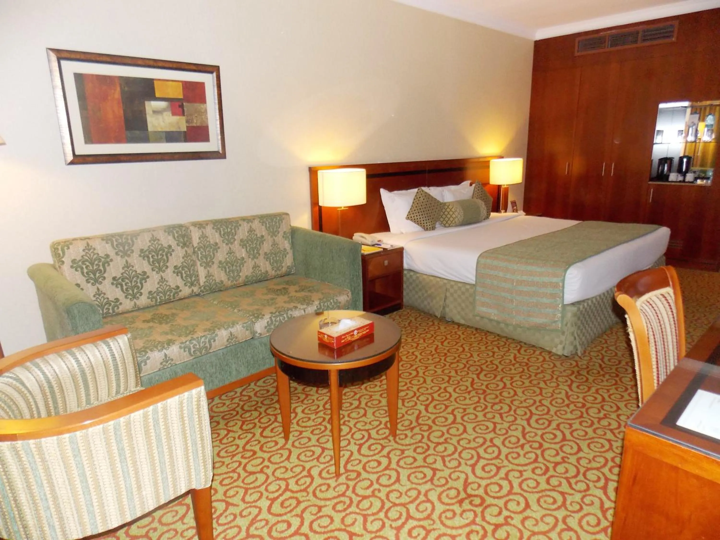 Photo of the whole room, Bed in Ramee Royal Hotel