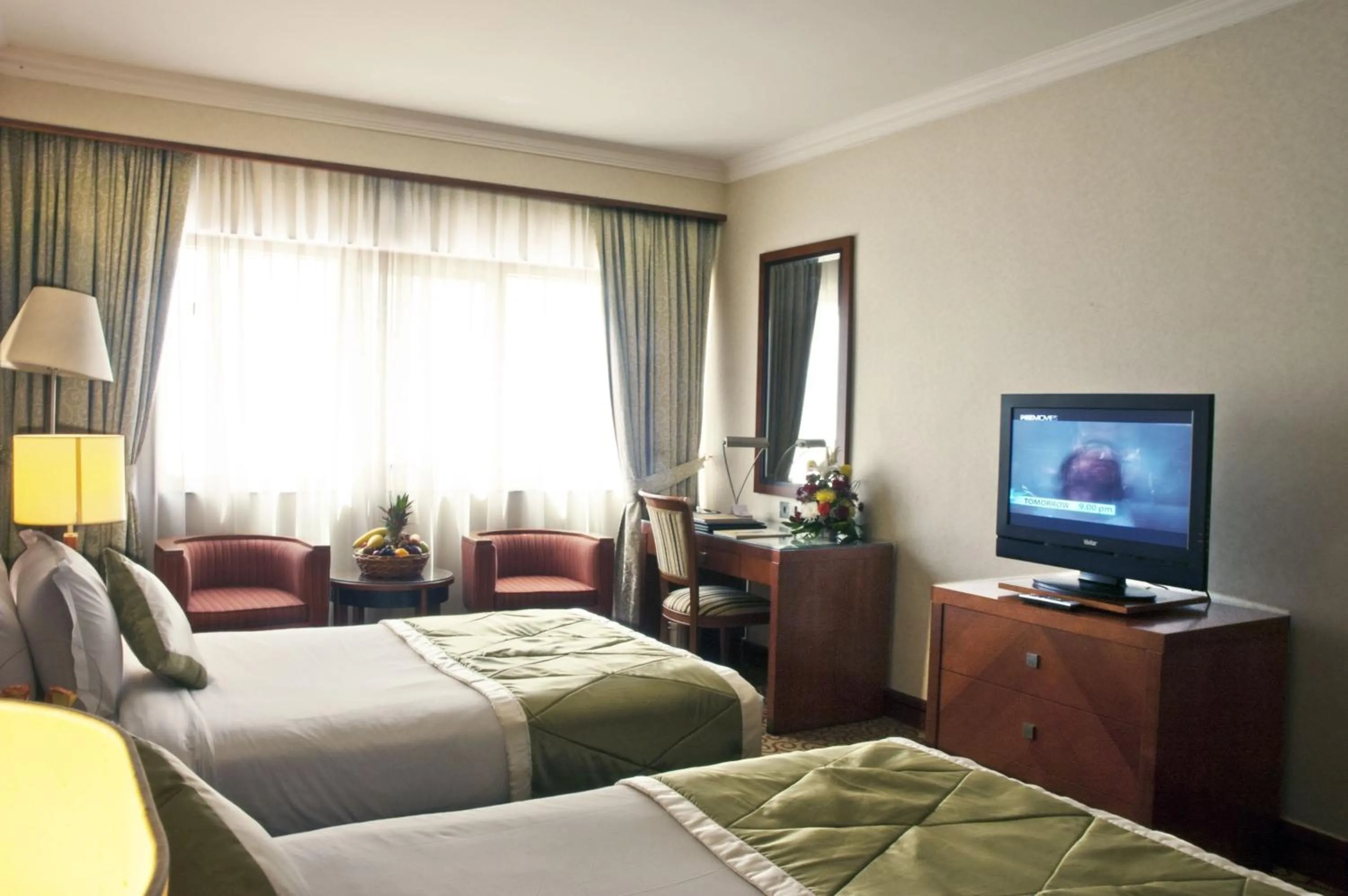Photo of the whole room, Bed in Ramee Royal Hotel