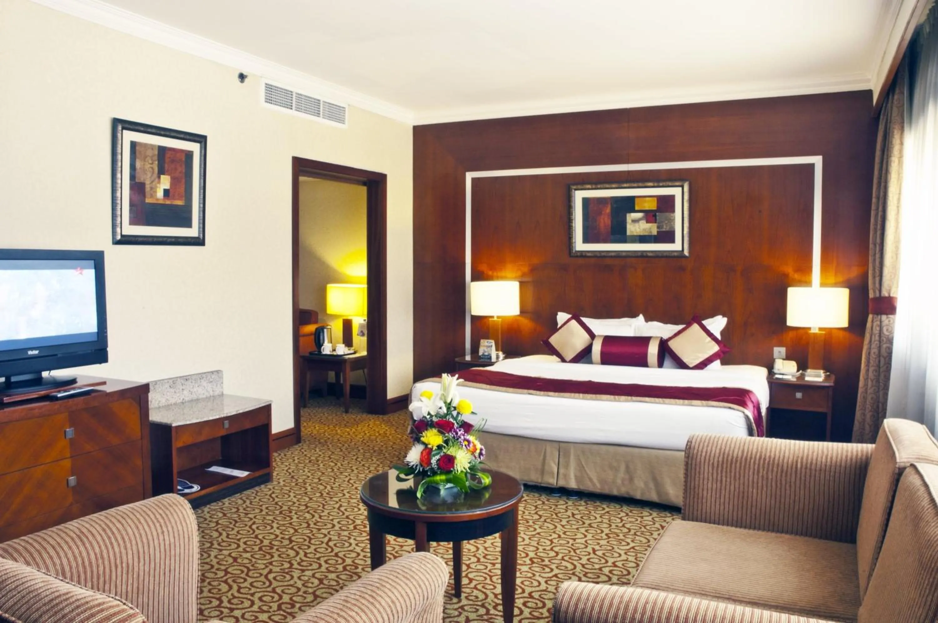 Photo of the whole room, Bed in Ramee Royal Hotel