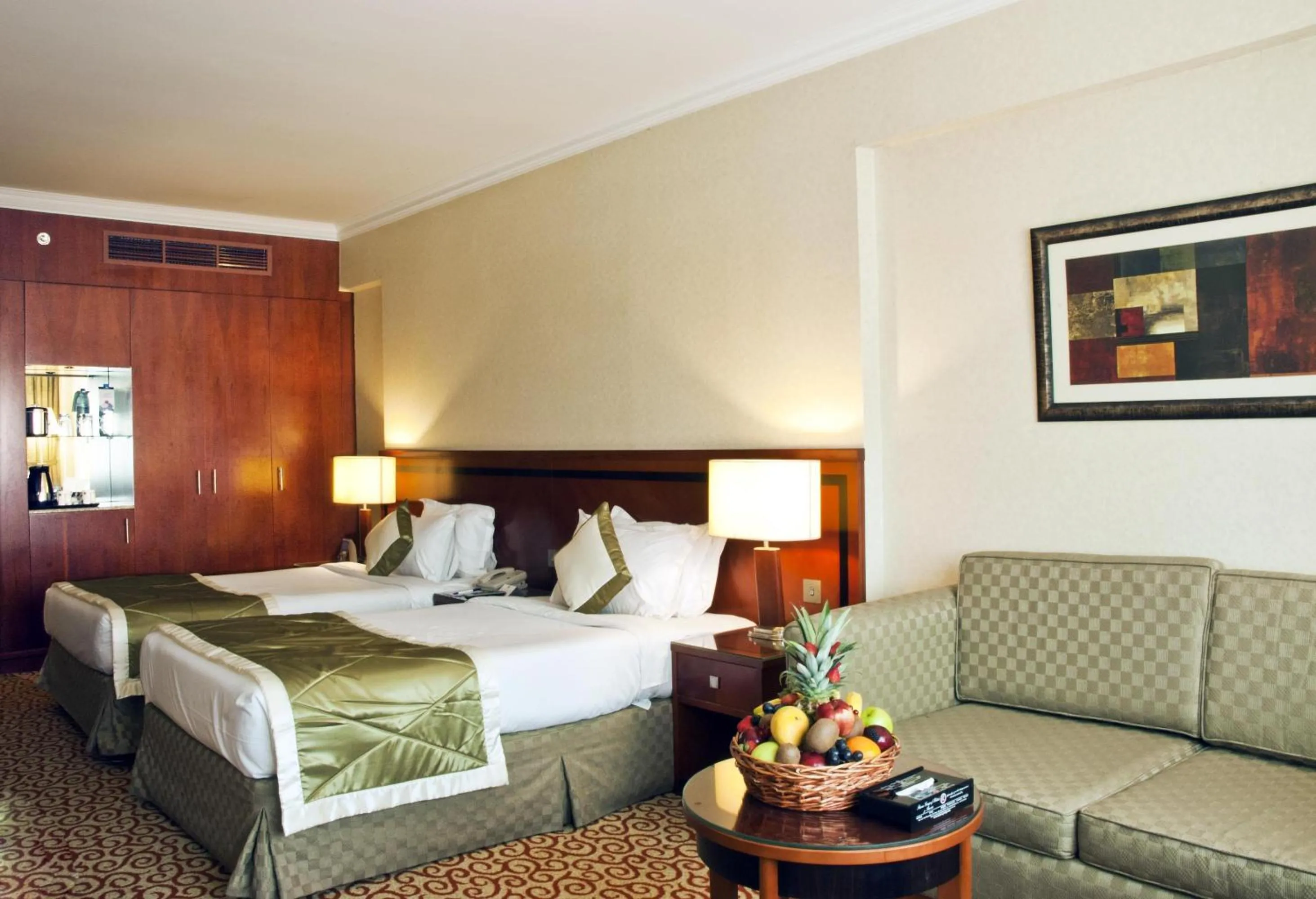 Photo of the whole room, Bed in Ramee Royal Hotel