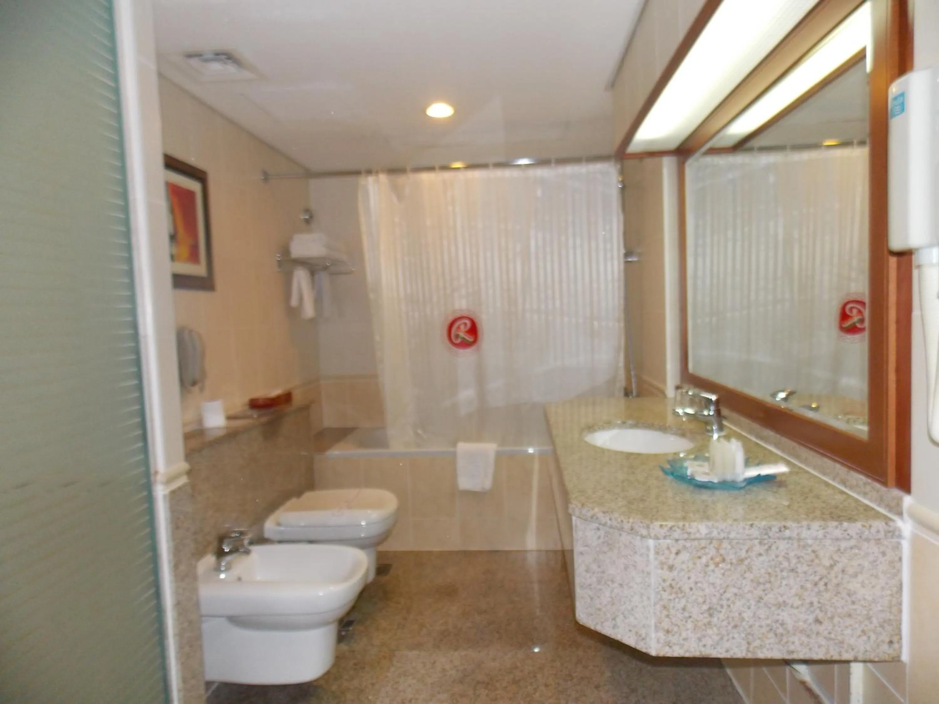 Bathroom in Ramee Royal Hotel