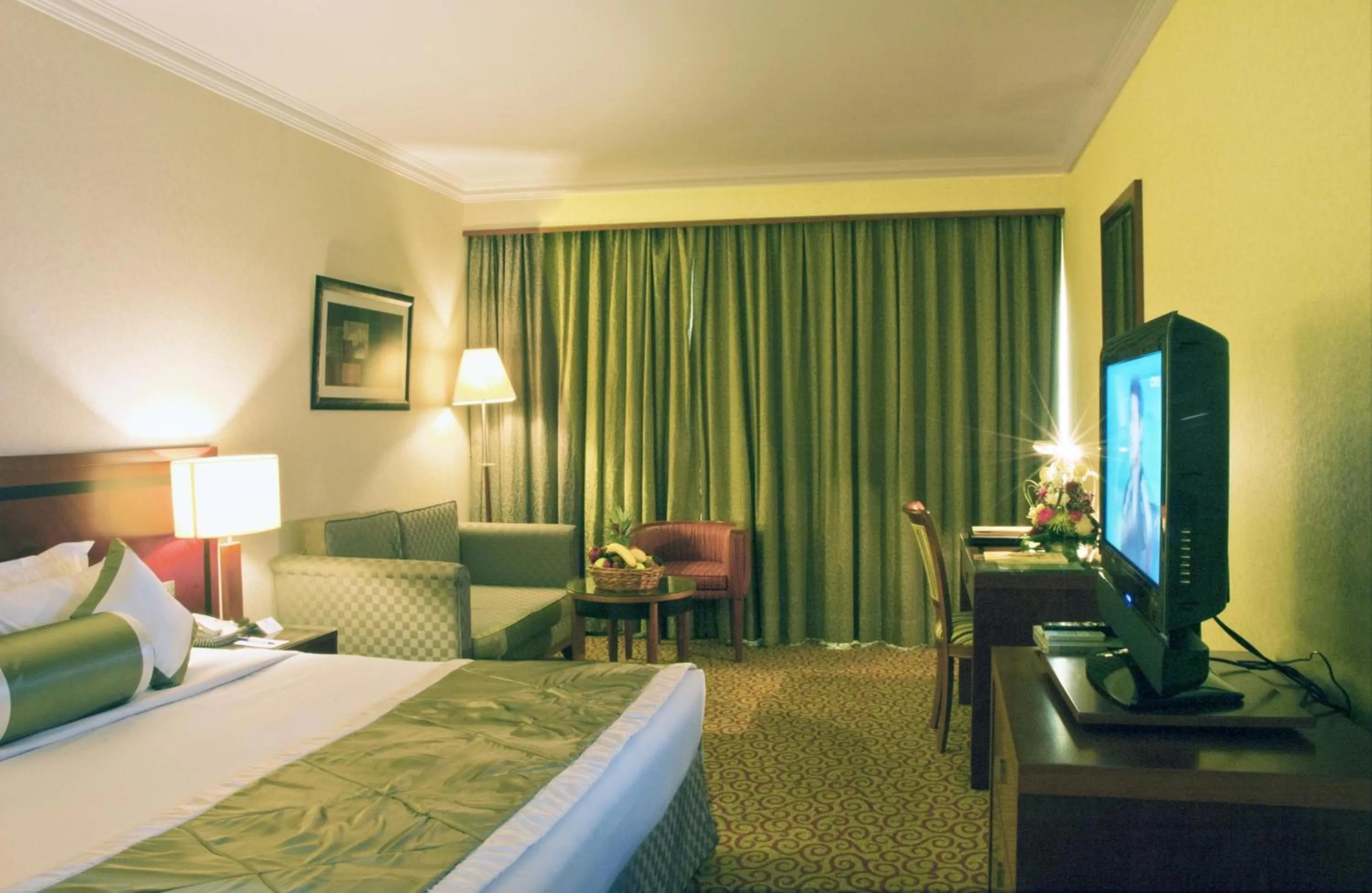 Photo of the whole room, Bed in Ramee Royal Hotel