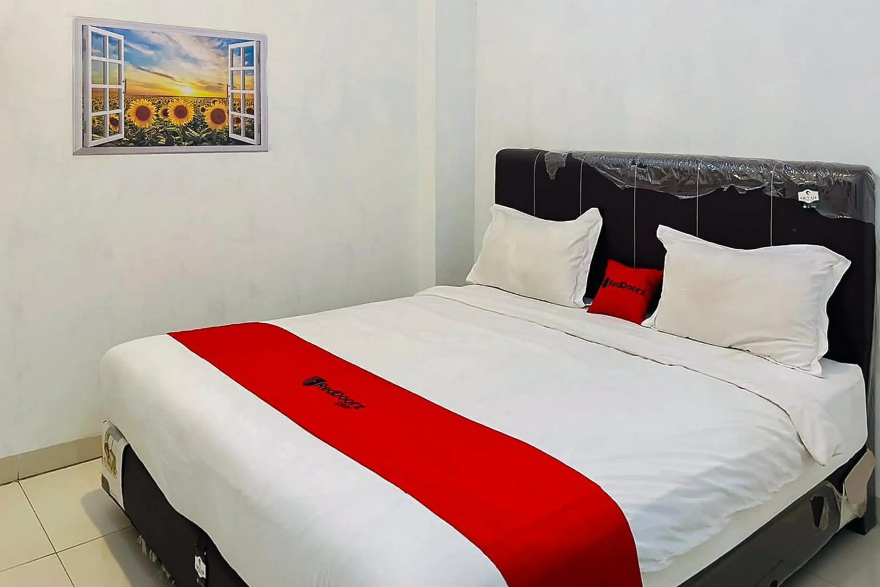 Bed in RedDoorz At Damai Guest House Kabanjahe Bed in RedDoorz At Damai Guest House Kabanjahe