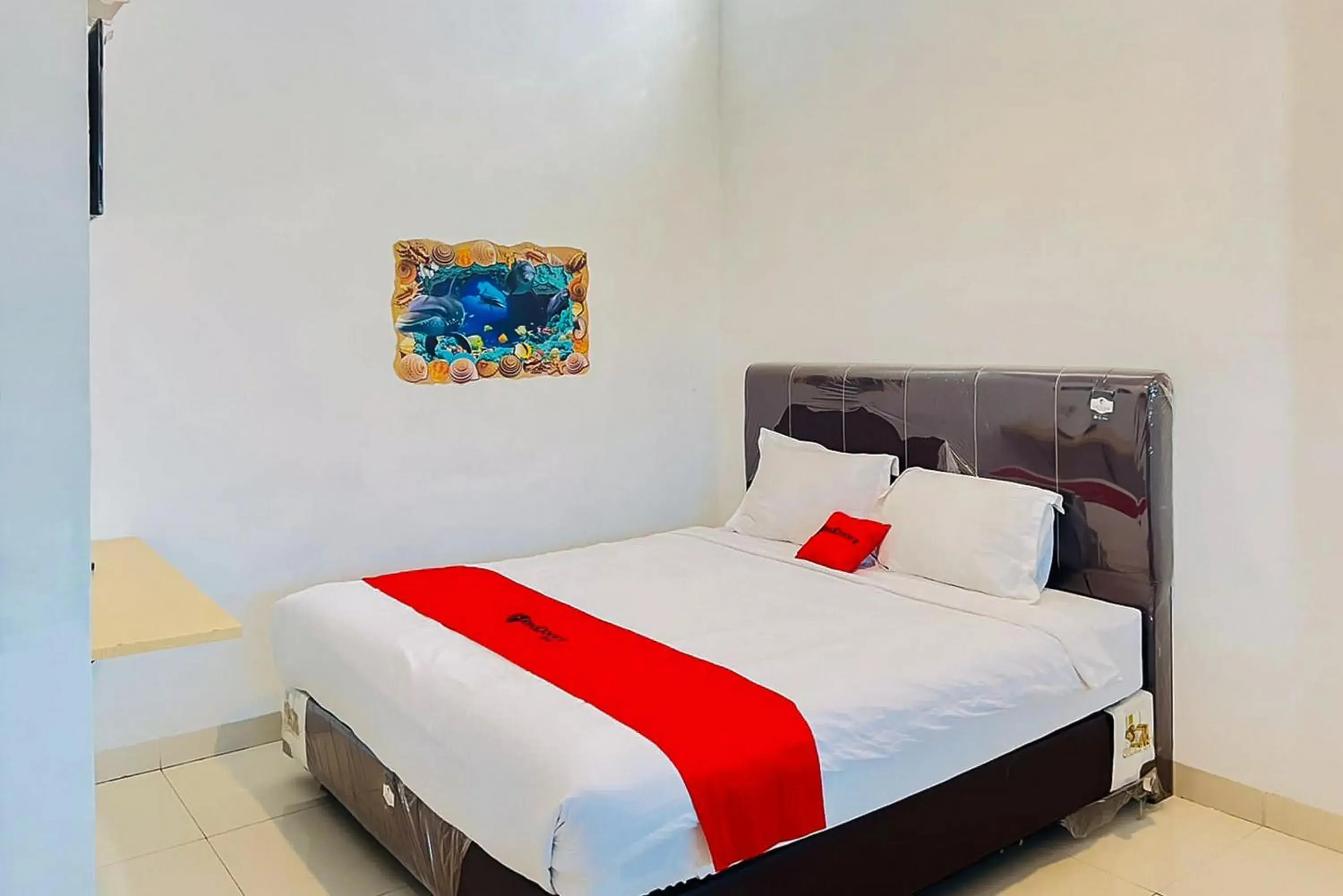 Bed in RedDoorz At Damai Guest House Kabanjahe Bed in RedDoorz At Damai Guest House Kabanjahe