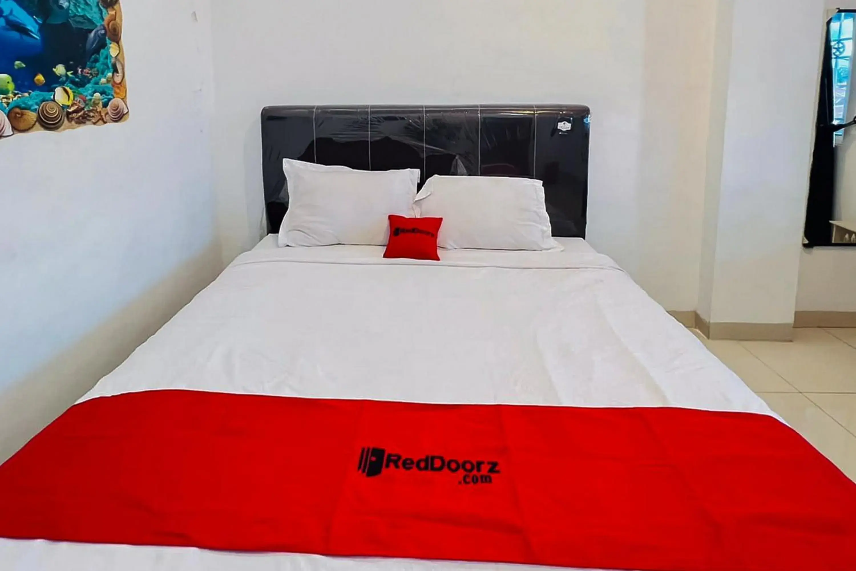 Bed in RedDoorz At Damai Guest House Kabanjahe Bed in RedDoorz At Damai Guest House Kabanjahe