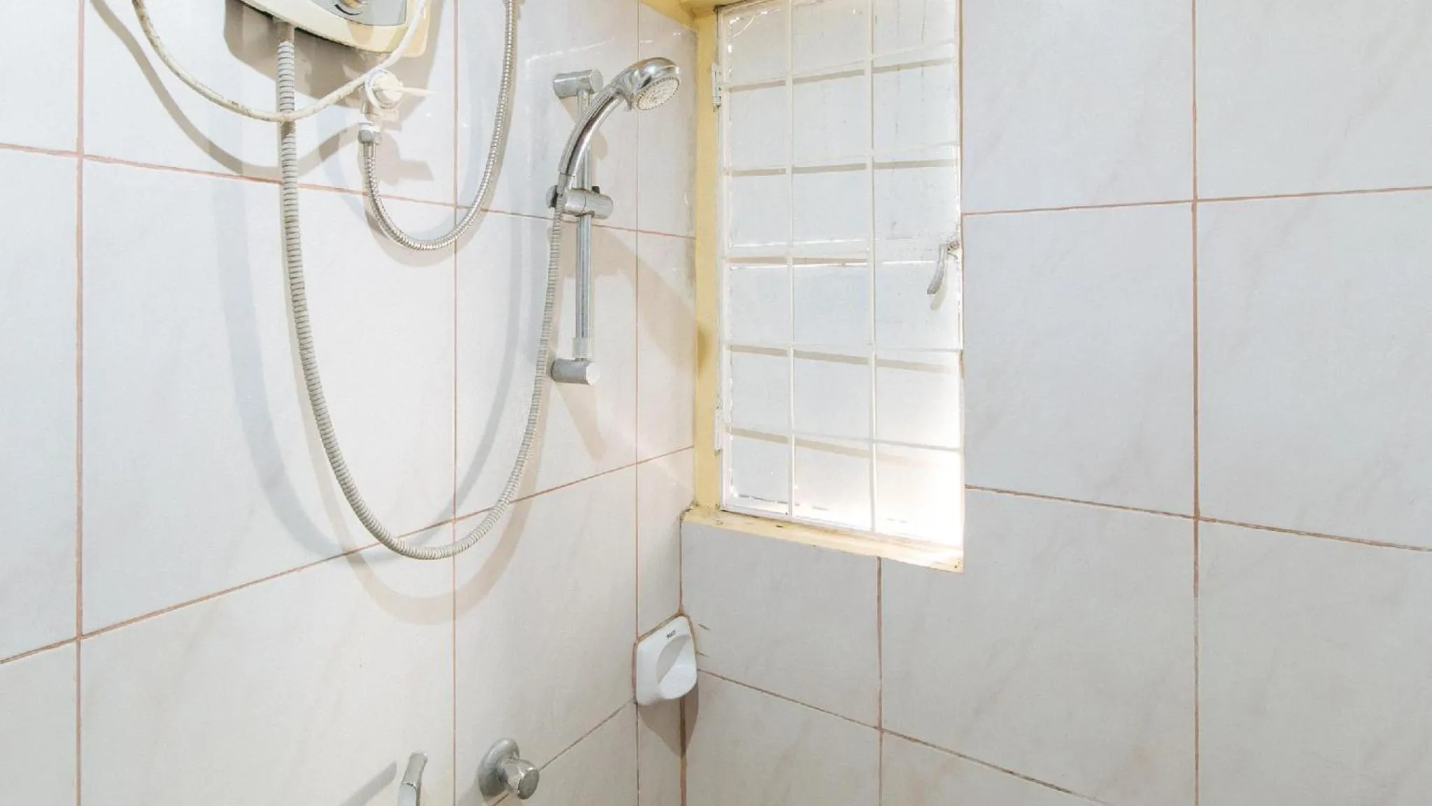 Shower in RedDoorz near SM Batangas City