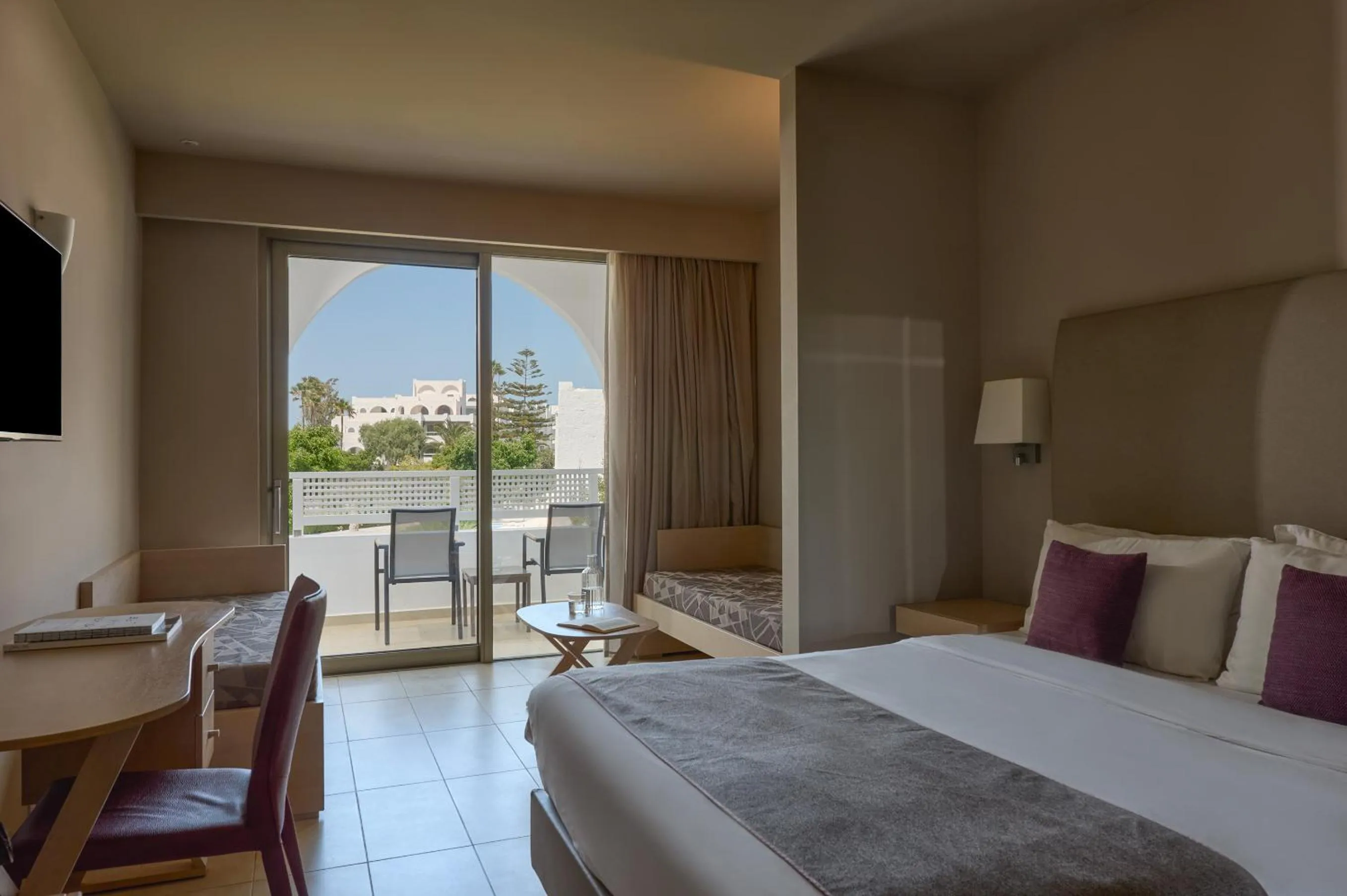 Bed in Atlantica Akti Zeus Hotel